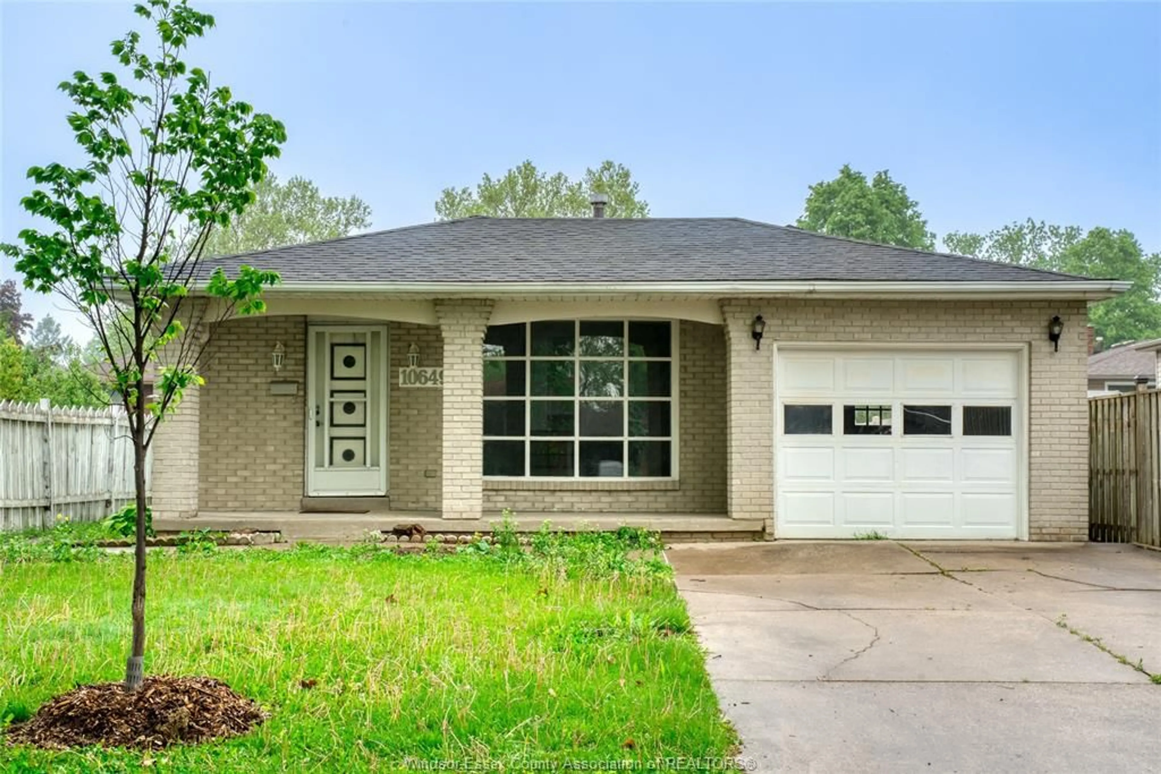 Home with brick exterior material, street for 10649 HALSTEAD Cres, Windsor Ontario N8R 2C3