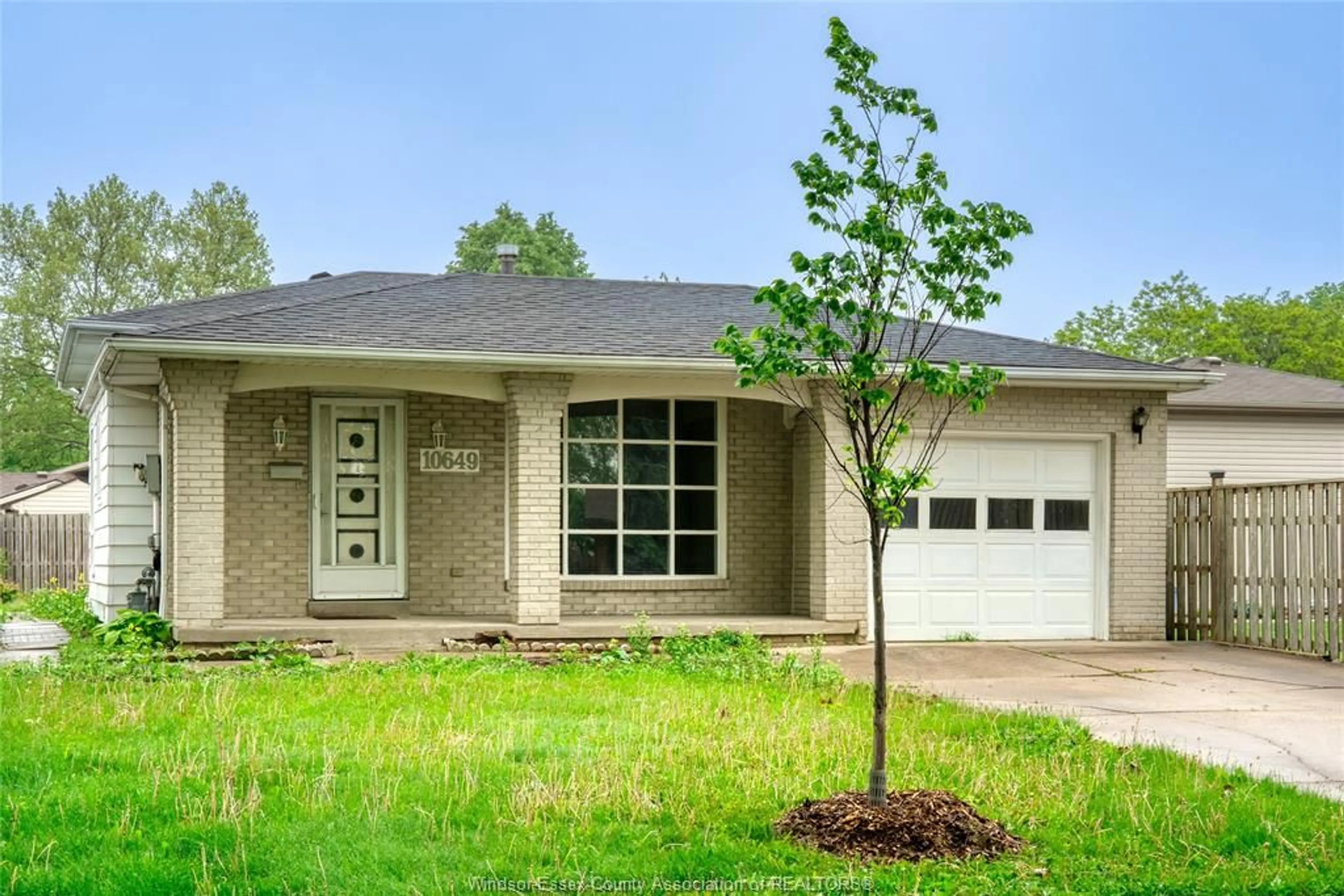 Home with brick exterior material, street for 10649 HALSTEAD Cres, Windsor Ontario N8R 2C3