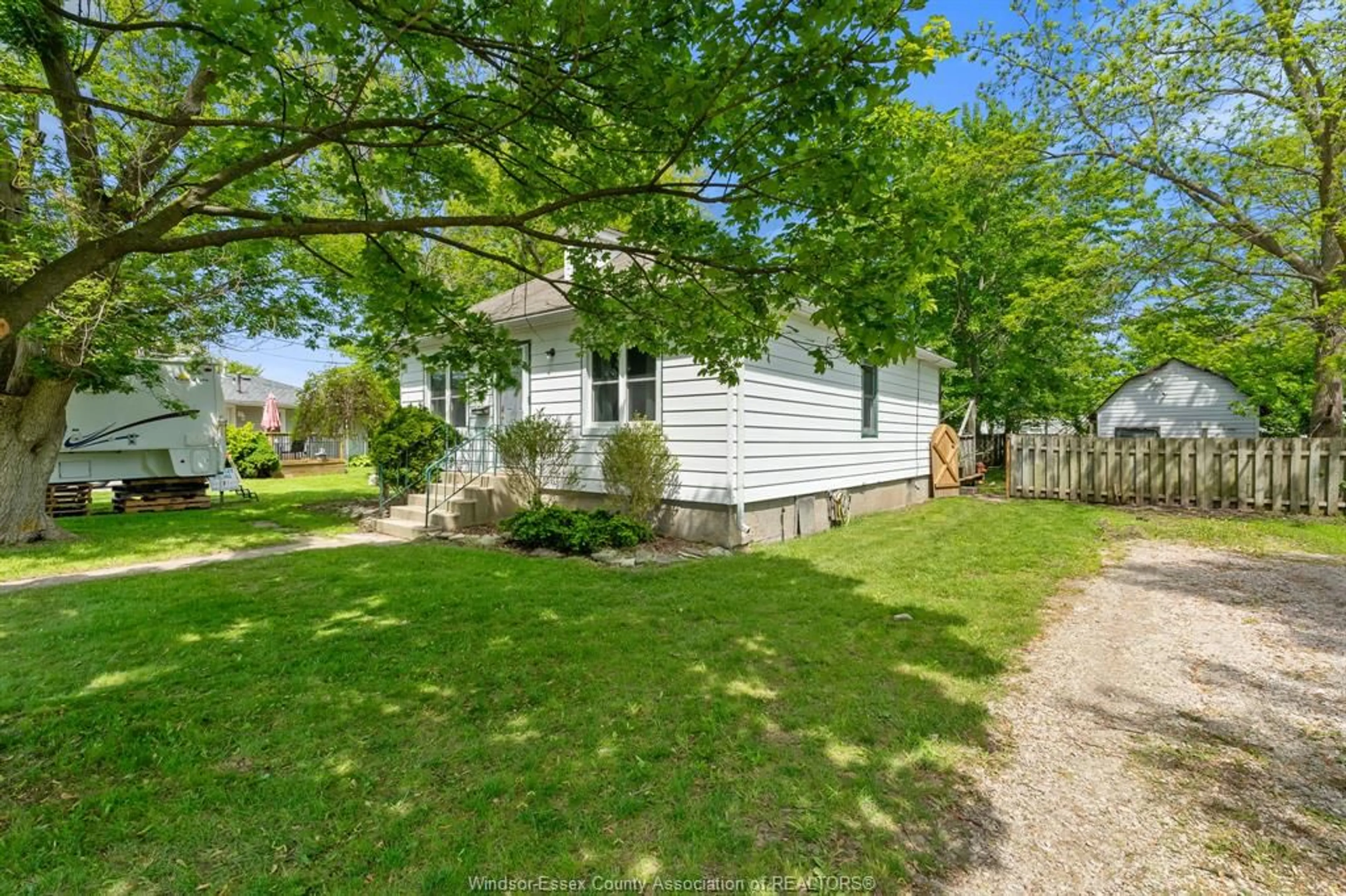 A pic from outside/outdoor area/front of a property/back of a property/a pic from drone, street for 63 Baird Ave, Wheatley Ontario N0P 2P0