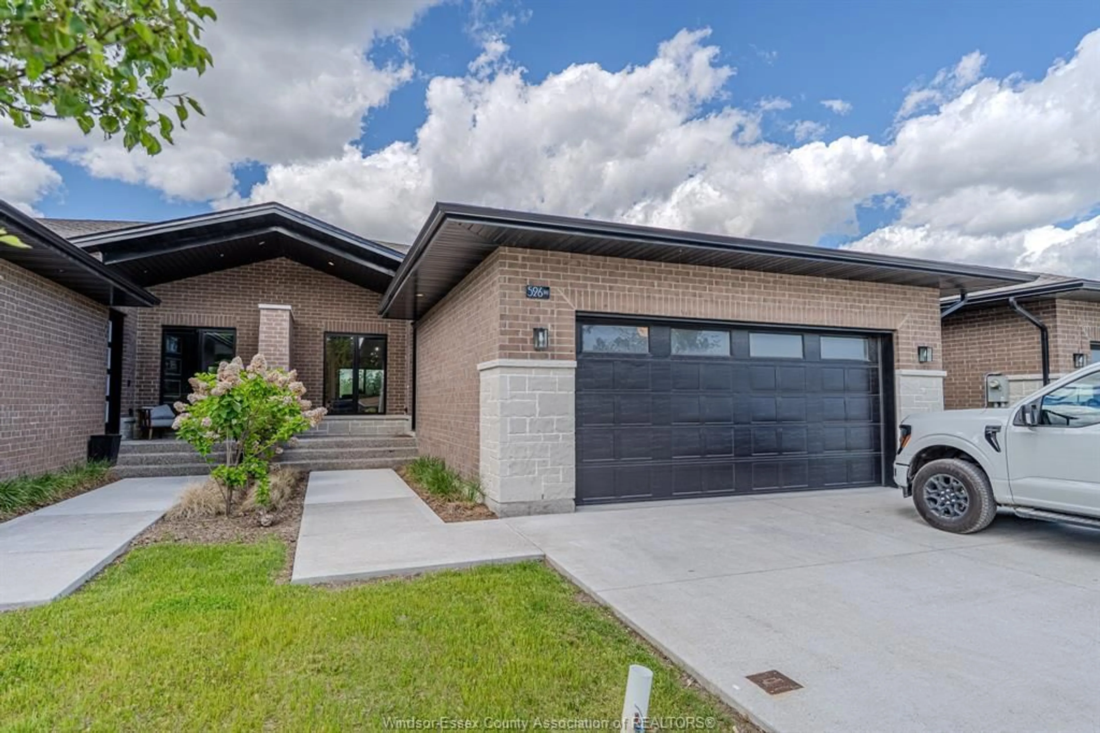 Home with brick exterior material, street for 526 LILY MAC, Windsor Ontario N6E 3N7