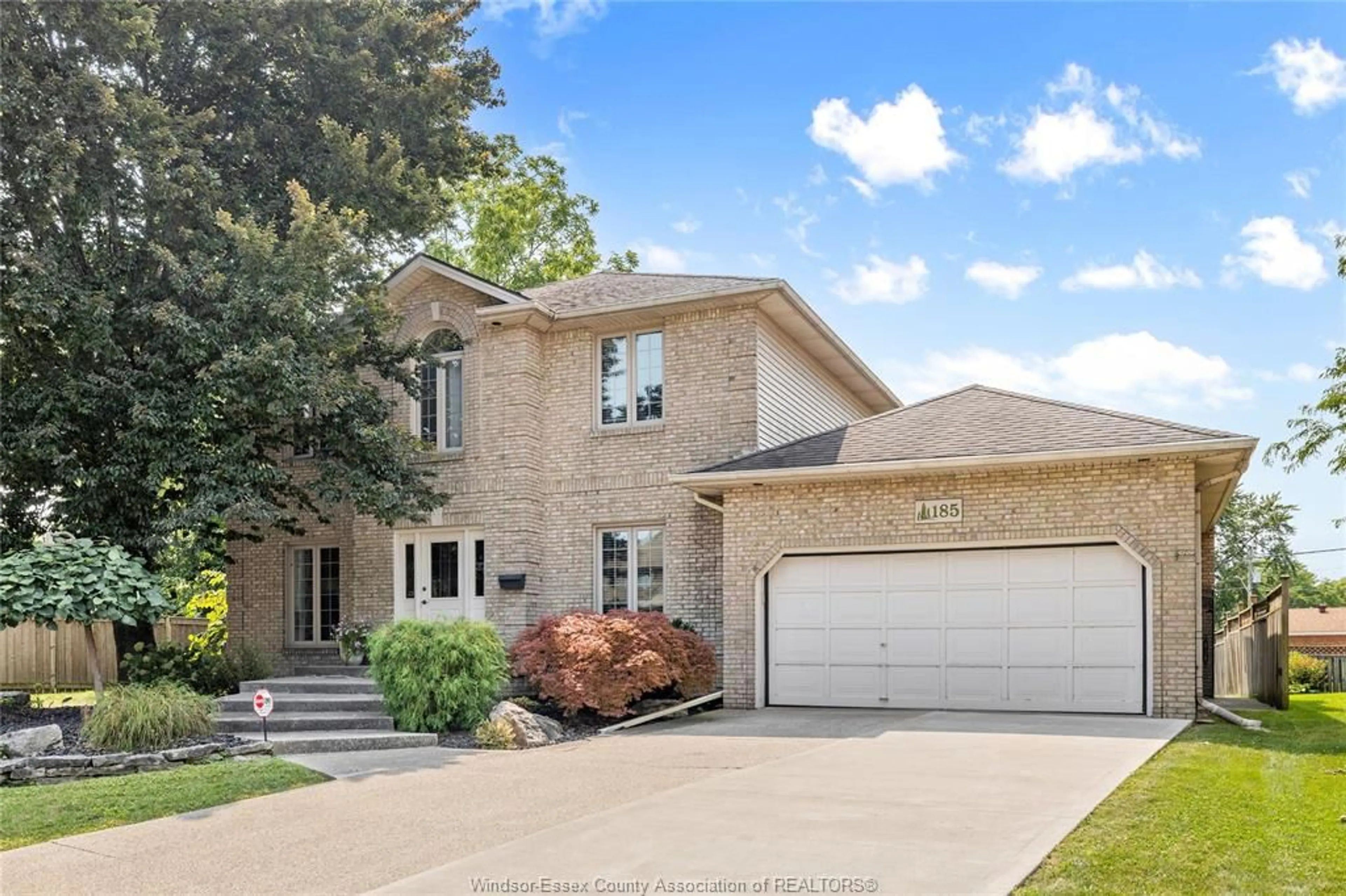 Home with brick exterior material, street for 185 PINEWOOD Cres, Tecumseh Ontario N8N 4P9