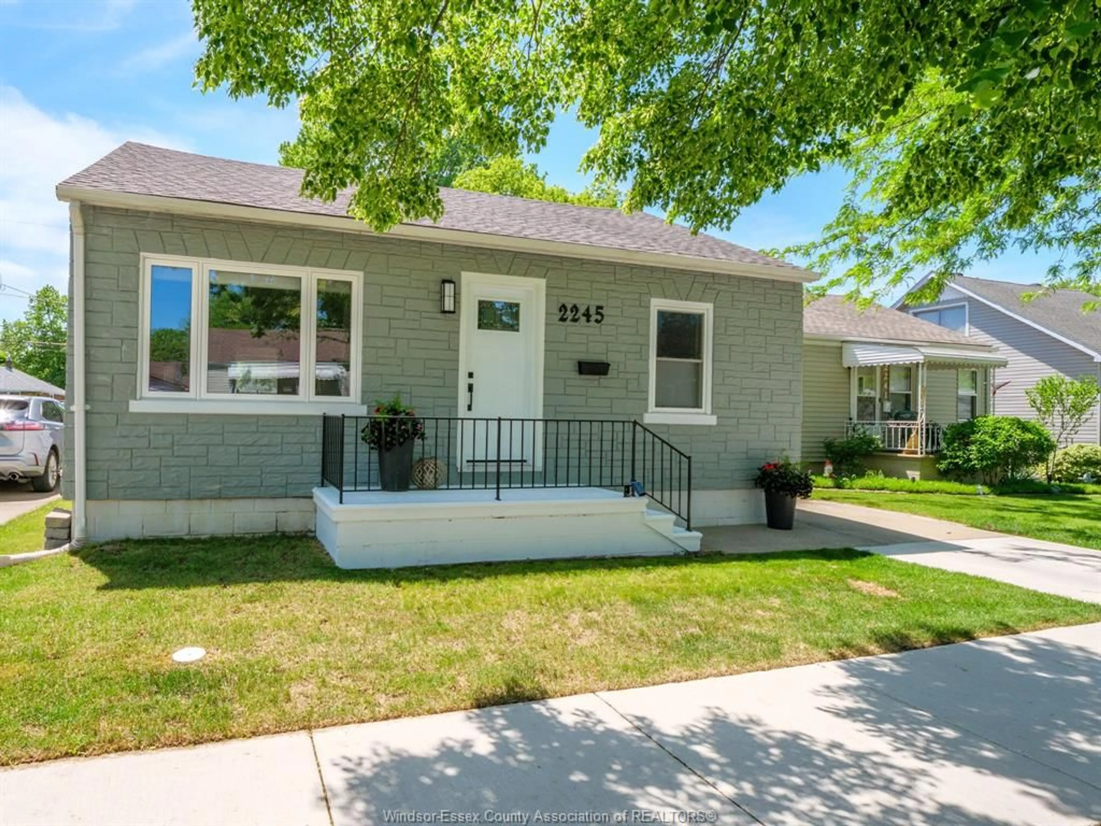 Home with vinyl exterior material, street for 2245 Wellesley Ave, Windsor Ontario N8W 2G1