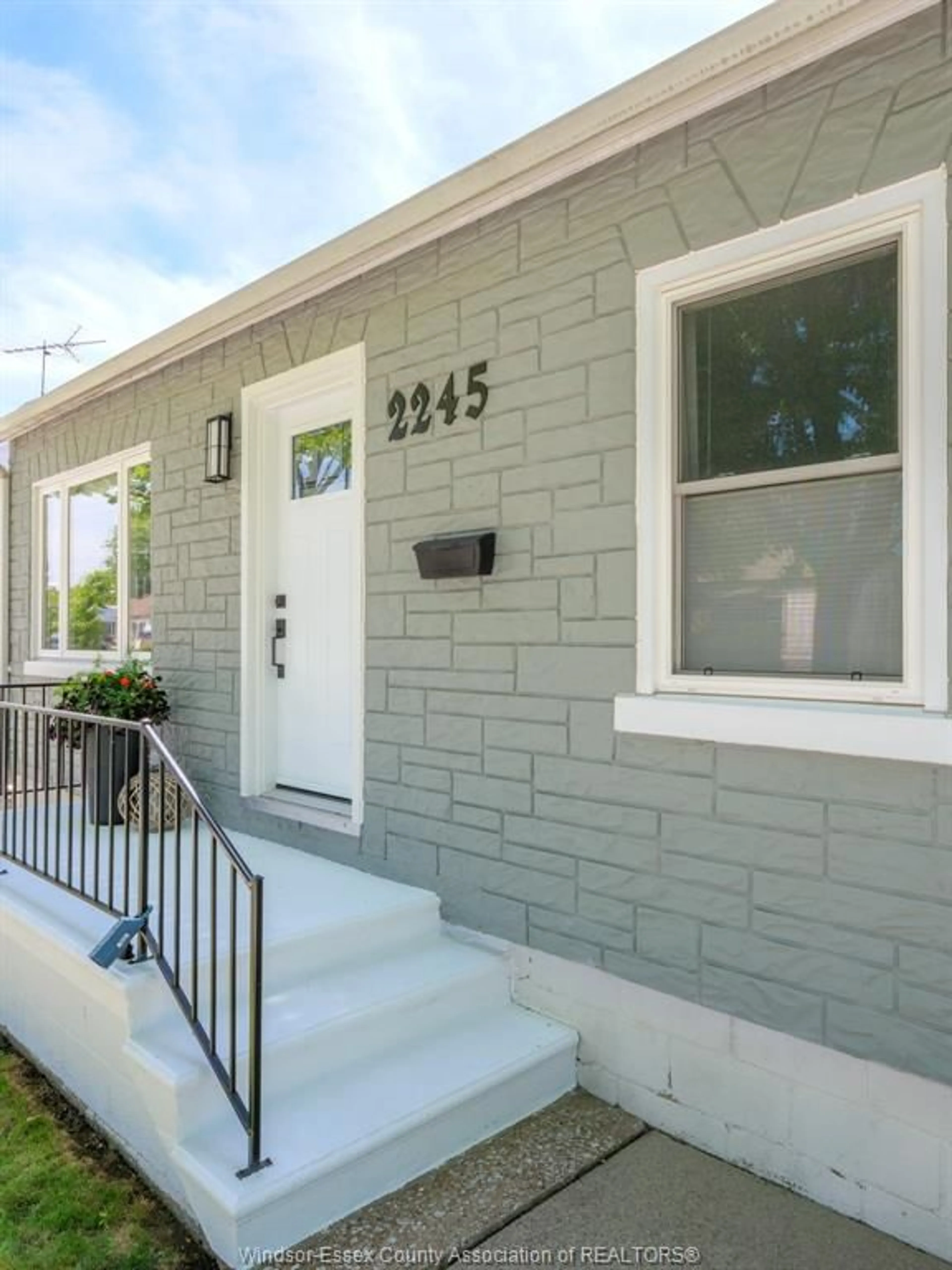 Home with vinyl exterior material, street for 2245 Wellesley Ave, Windsor Ontario N8W 2G1