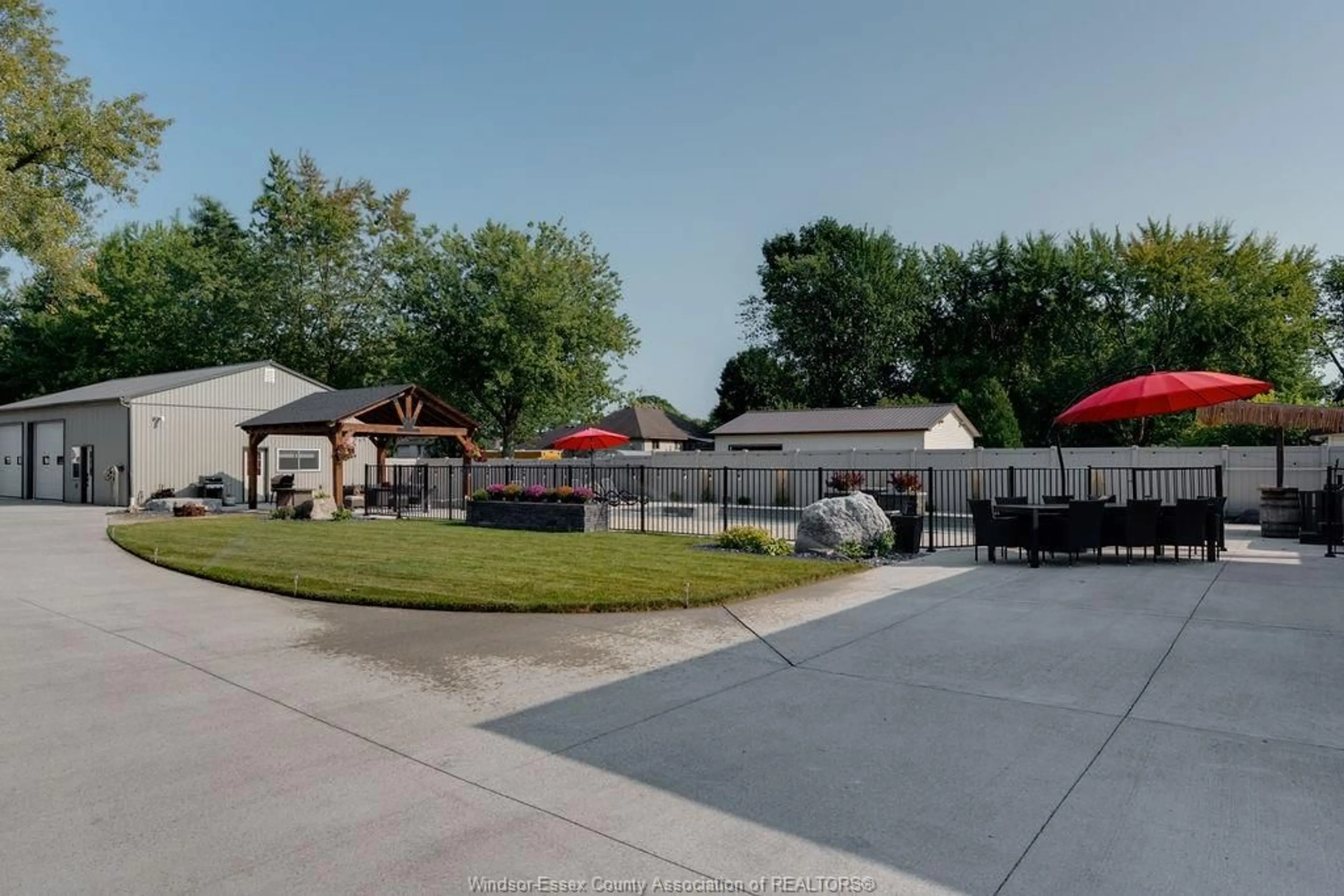 A pic from outside/outdoor area/front of a property/back of a property/a pic from drone, street for 2380 LESPERANCE Rd, Tecumseh Ontario N8N 2W4