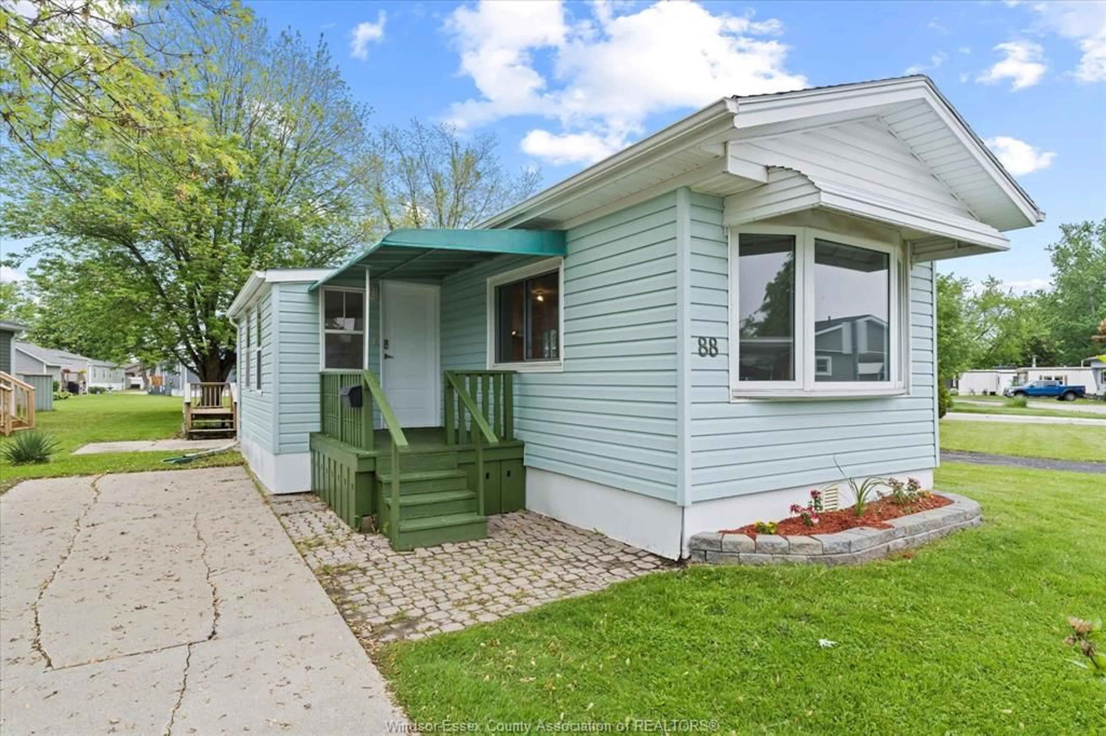 Home with vinyl exterior material, street for 88 DANA, Essex Ontario N8M 1Z8