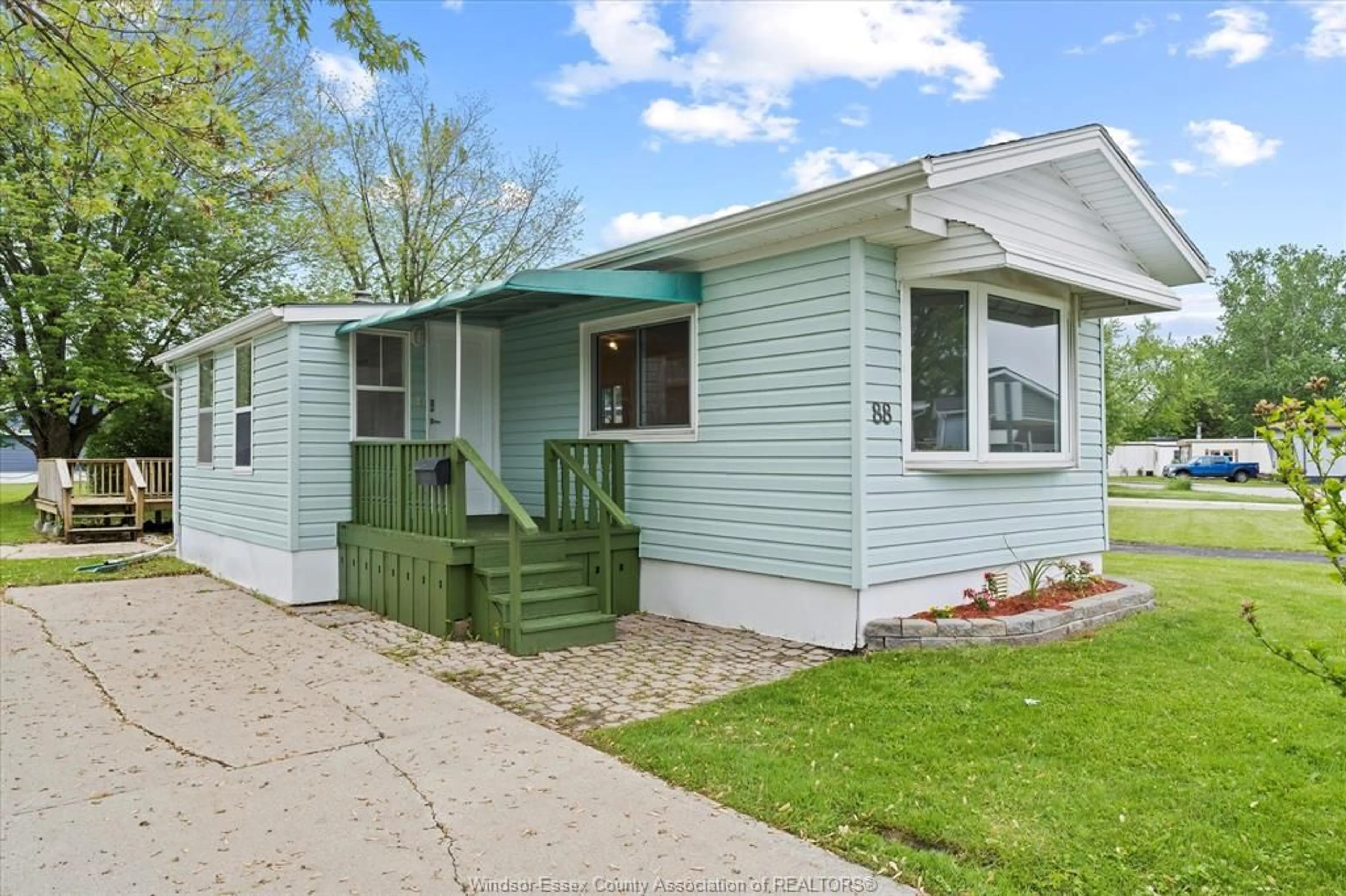 Home with vinyl exterior material, street for 88 DANA, Essex Ontario N8M 1Z8