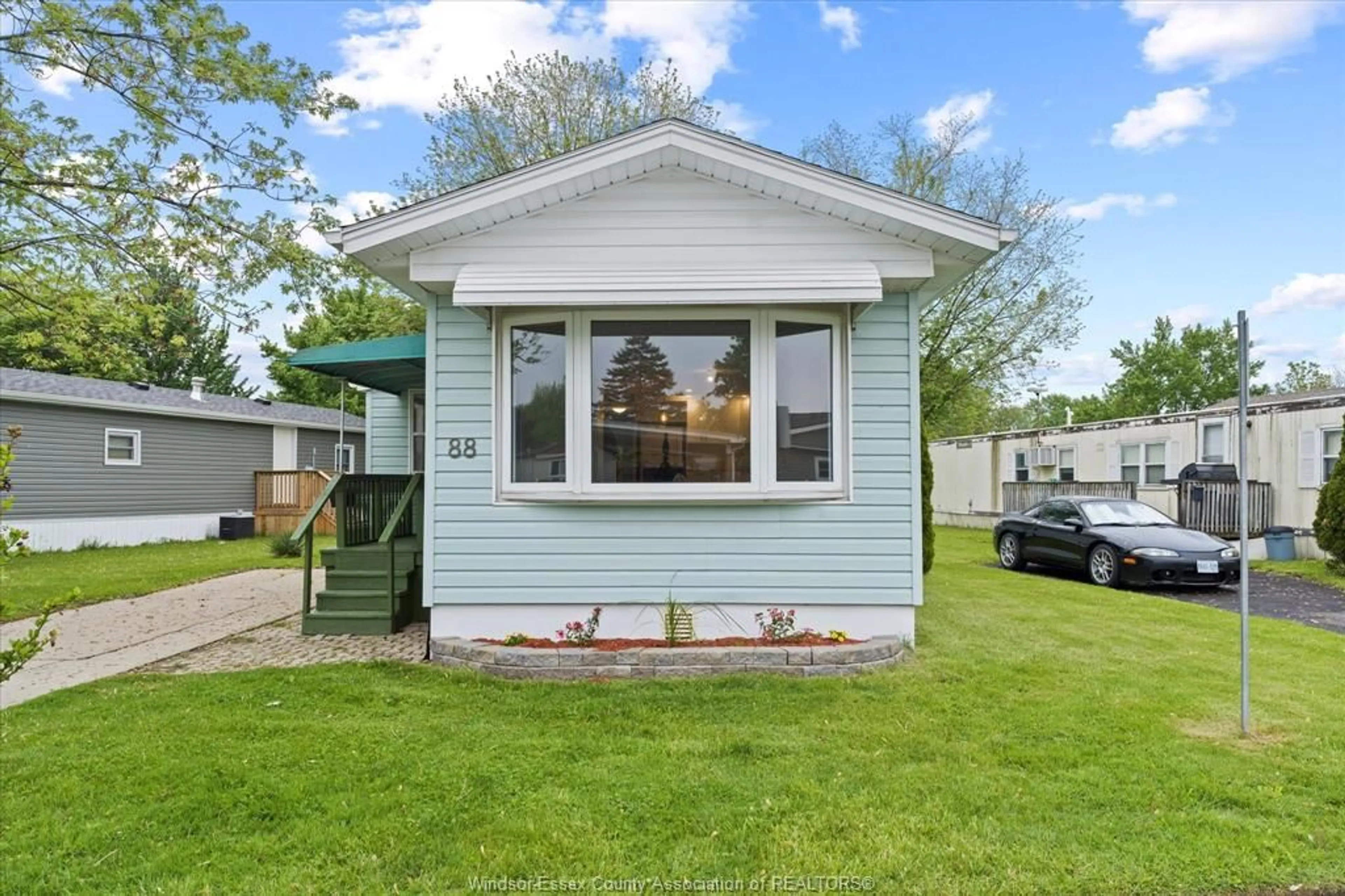 Home with vinyl exterior material, street for 88 DANA, Essex Ontario N8M 1Z8