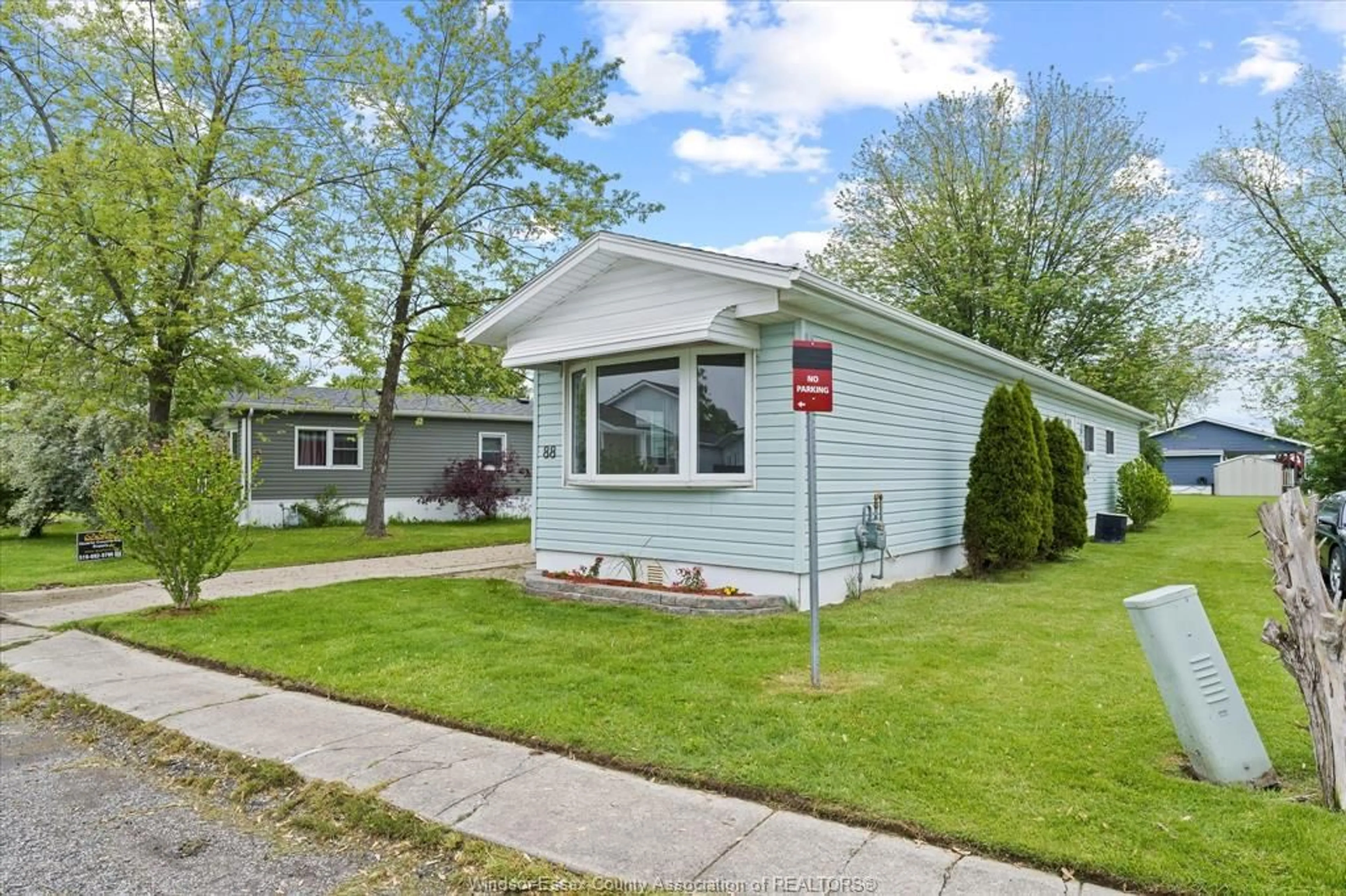 Home with vinyl exterior material, street for 88 DANA, Essex Ontario N8M 1Z8