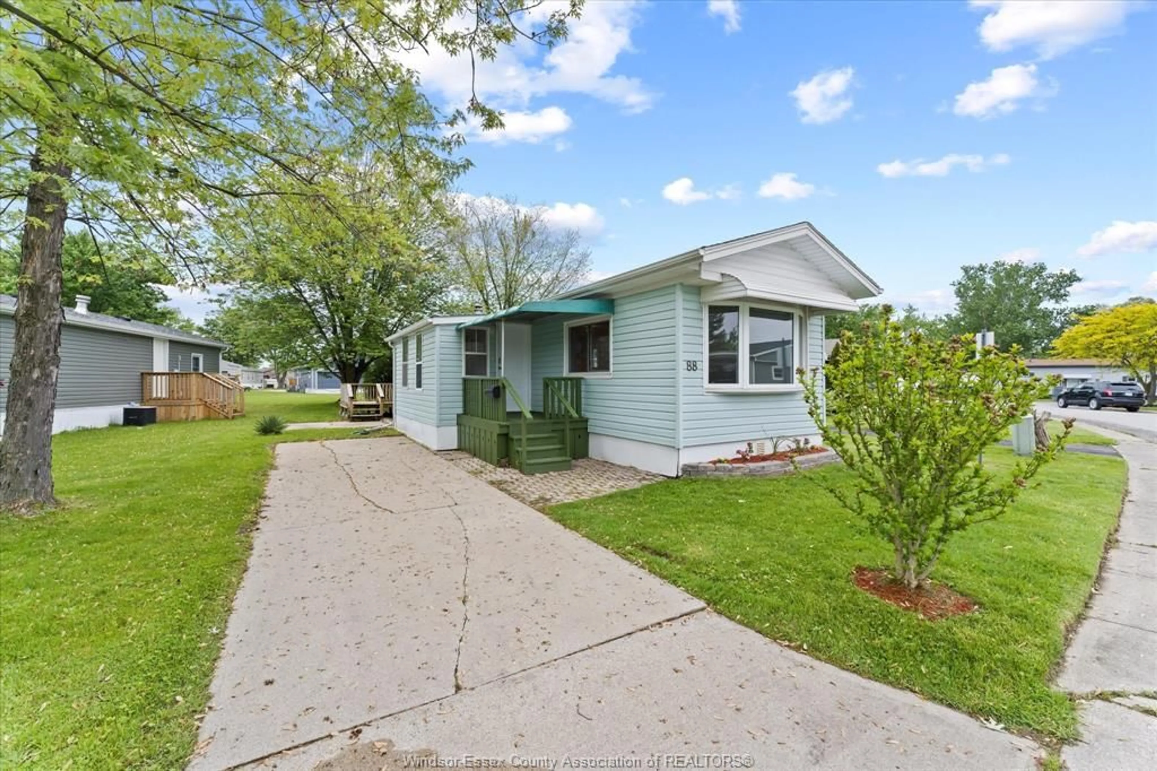 Home with vinyl exterior material, street for 88 DANA, Essex Ontario N8M 1Z8