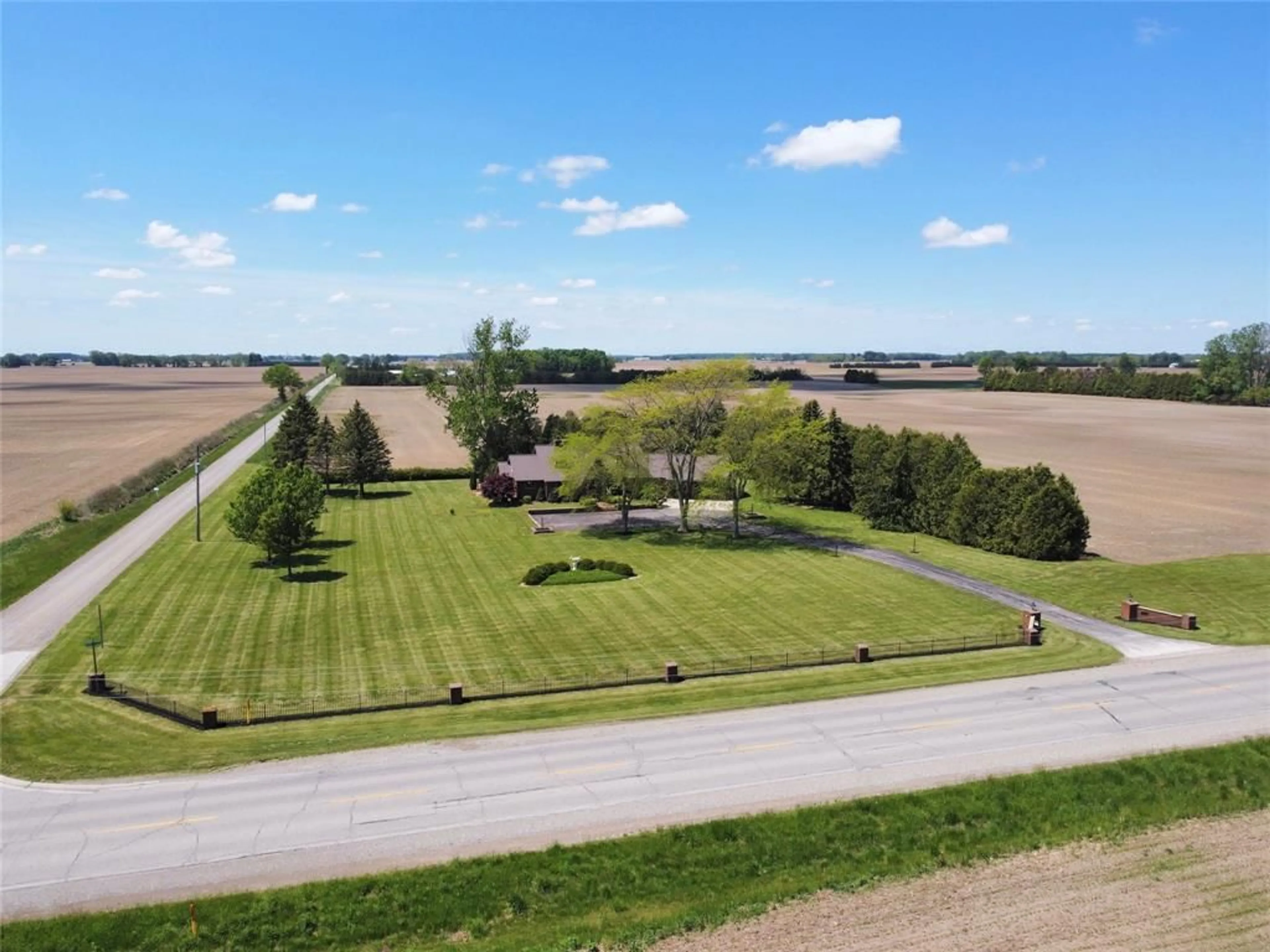 A pic from outside/outdoor area/front of a property/back of a property/a pic from drone, street for 22410 Victoria Rd, Thamesville Ontario N0P 2K0