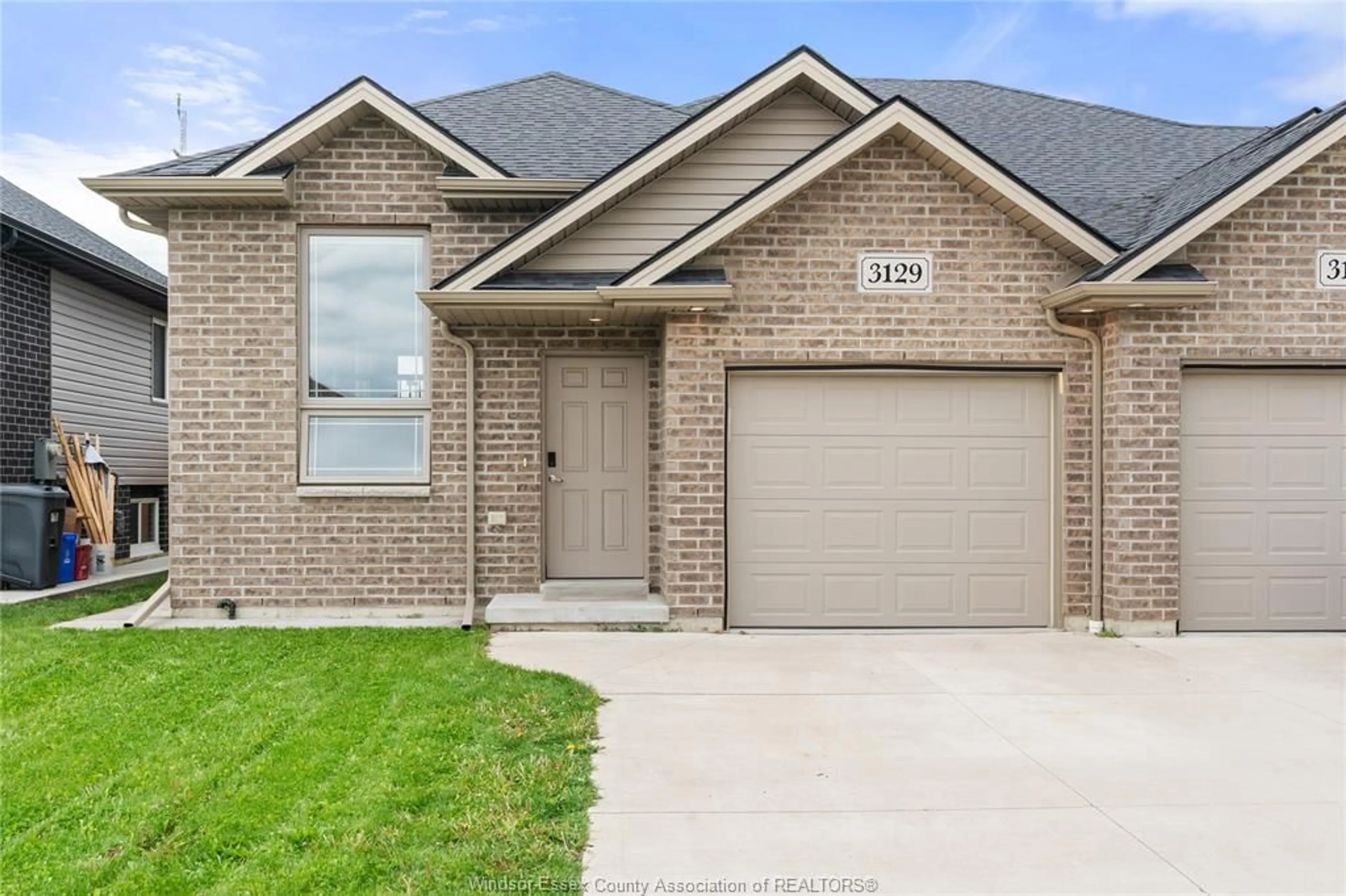 Home with brick exterior material, street for 3129 VIOLA Cres, Windsor Ontario N8N 0A1