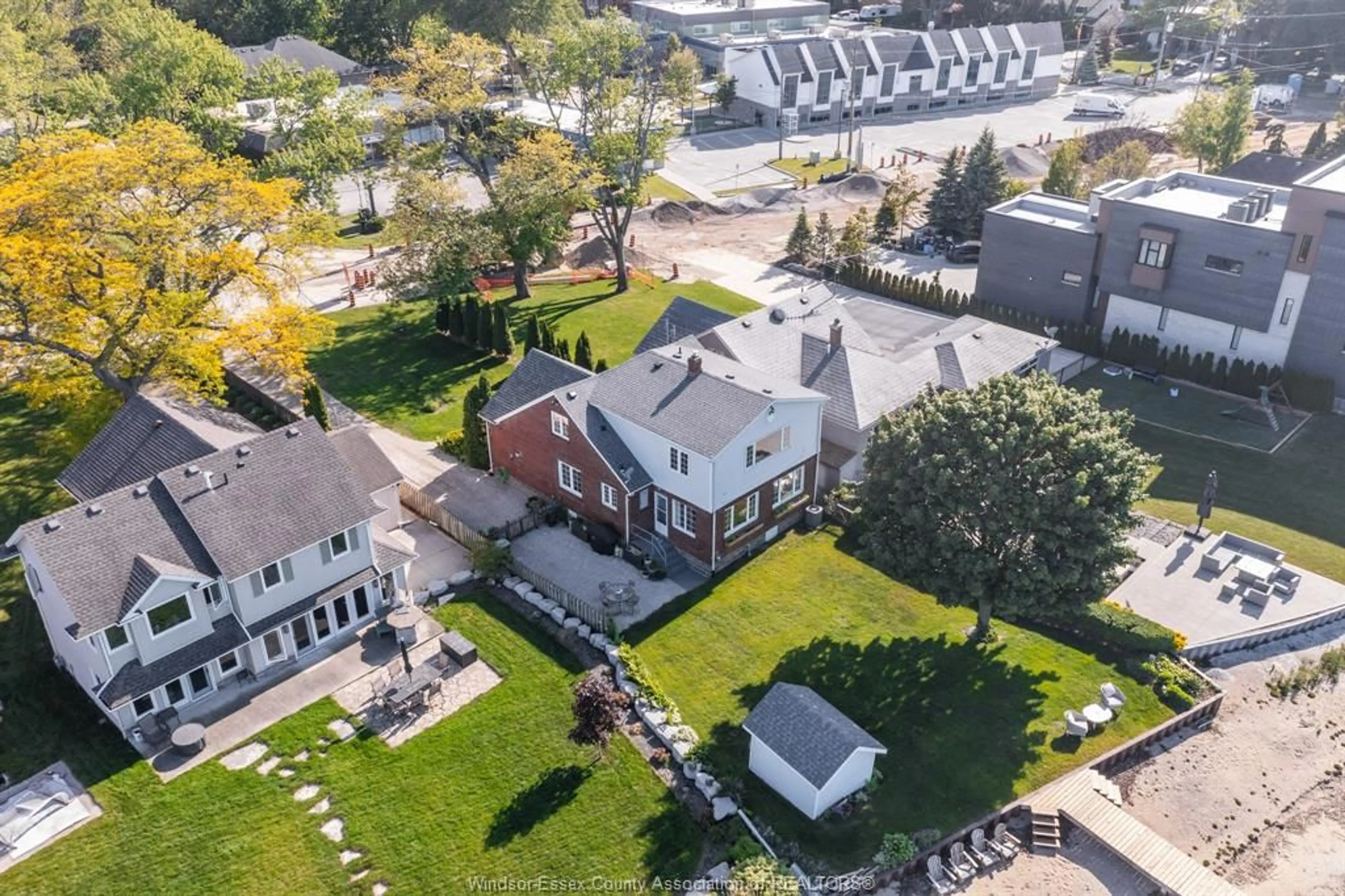 A pic from outside/outdoor area/front of a property/back of a property/a pic from drone, street for 13902 RIVERSIDE Dr, Tecumseh Ontario N8W 1B6