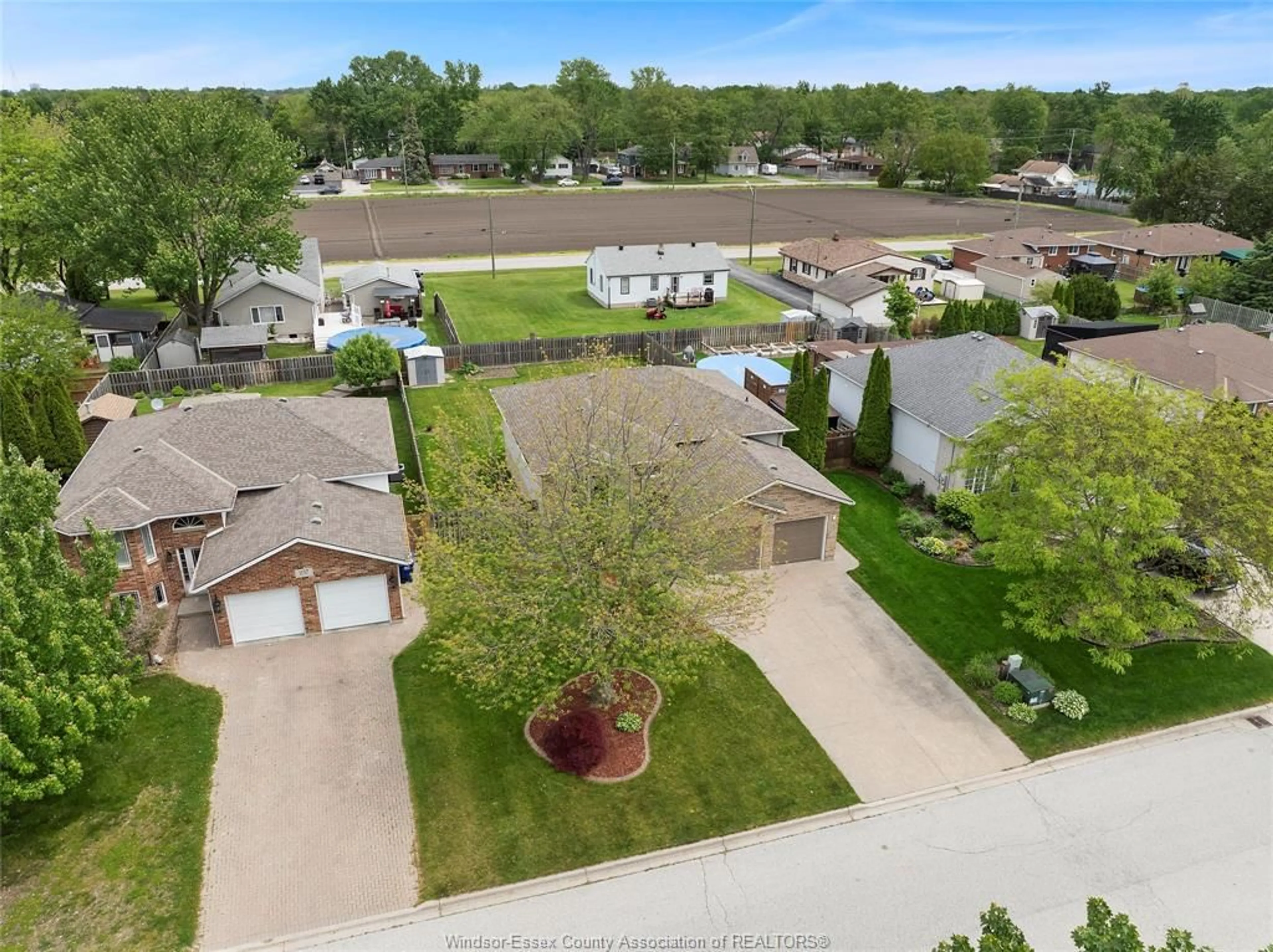 A pic from outside/outdoor area/front of a property/back of a property/a pic from drone, water/lake/river/ocean view for 261 FIELDS Ave, LaSalle Ontario N9J 3S3