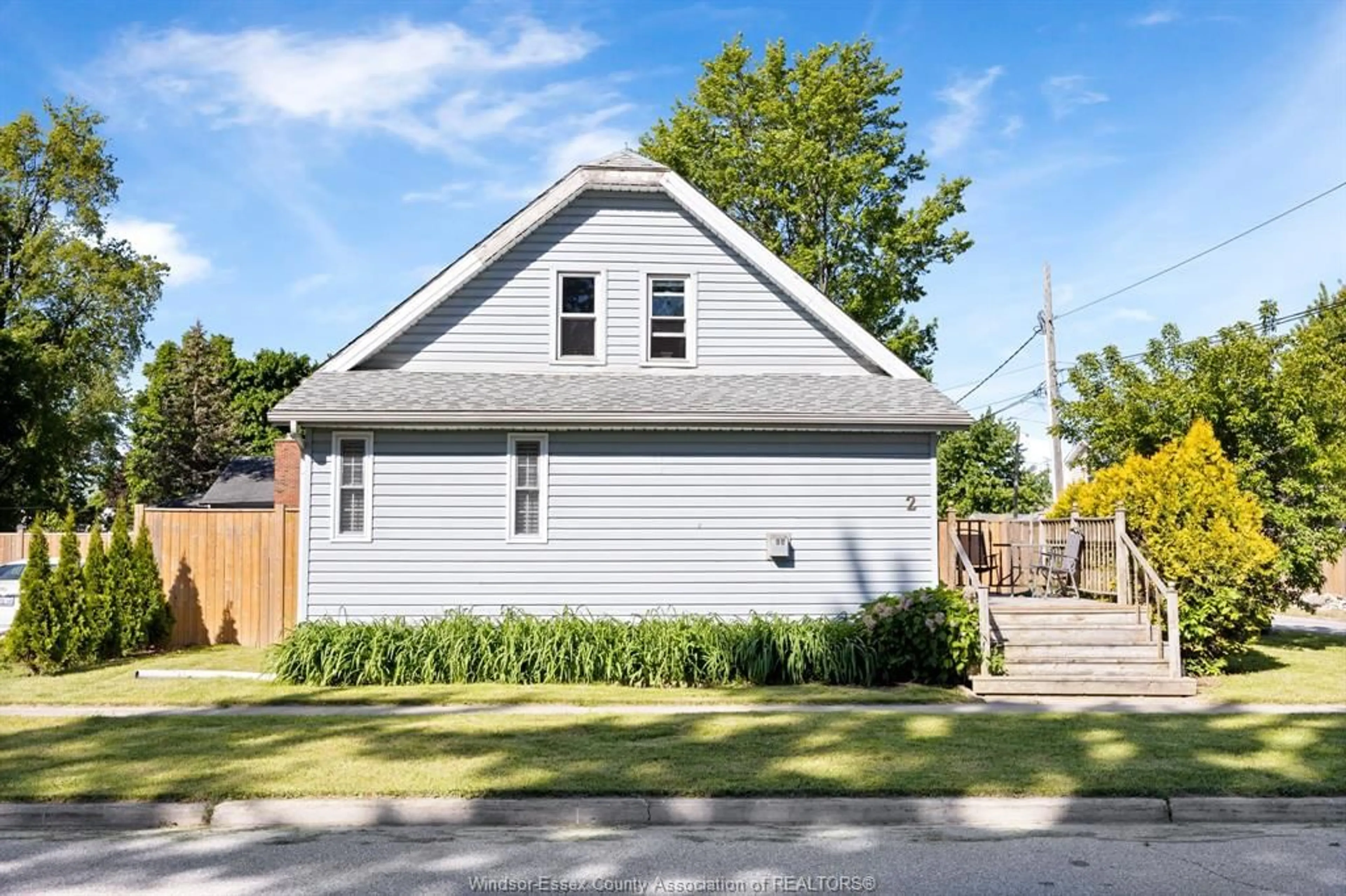 Home with vinyl exterior material, street for 2 LYON Ave, Tilbury Ontario N0P 2L0