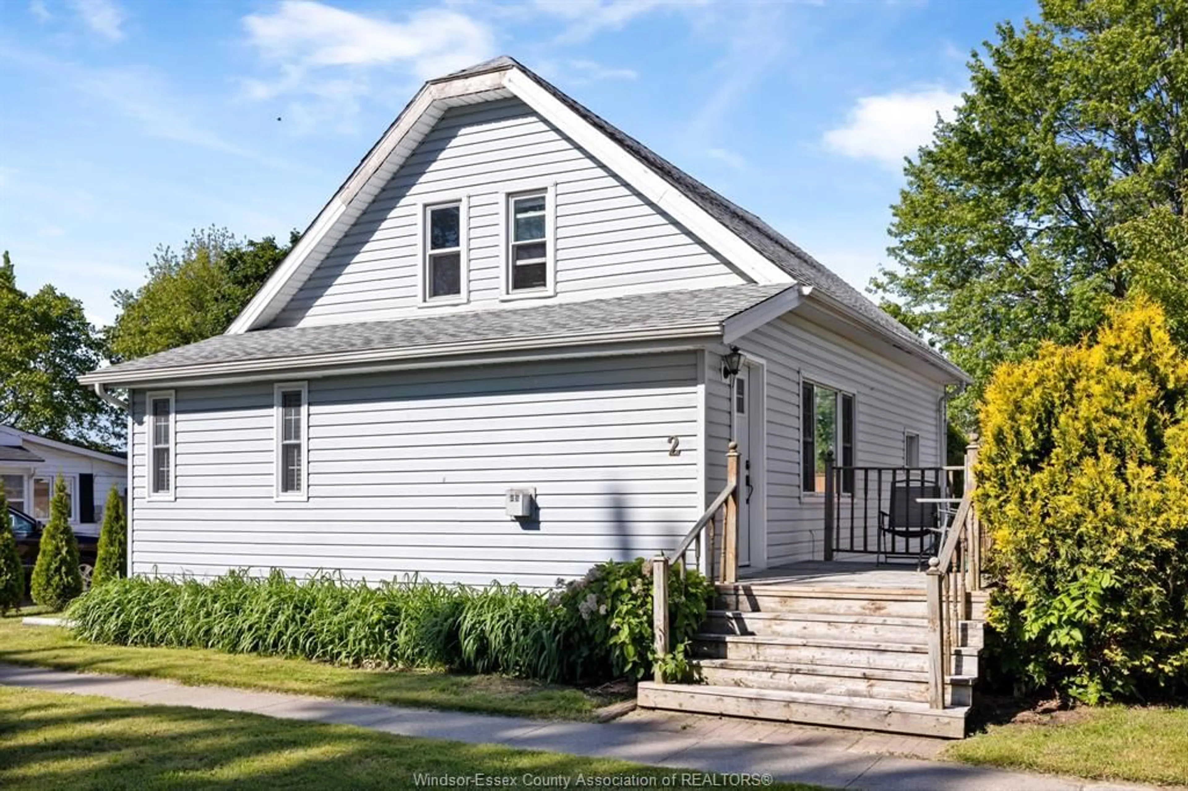 Home with vinyl exterior material, street for 2 LYON Ave, Tilbury Ontario N0P 2L0