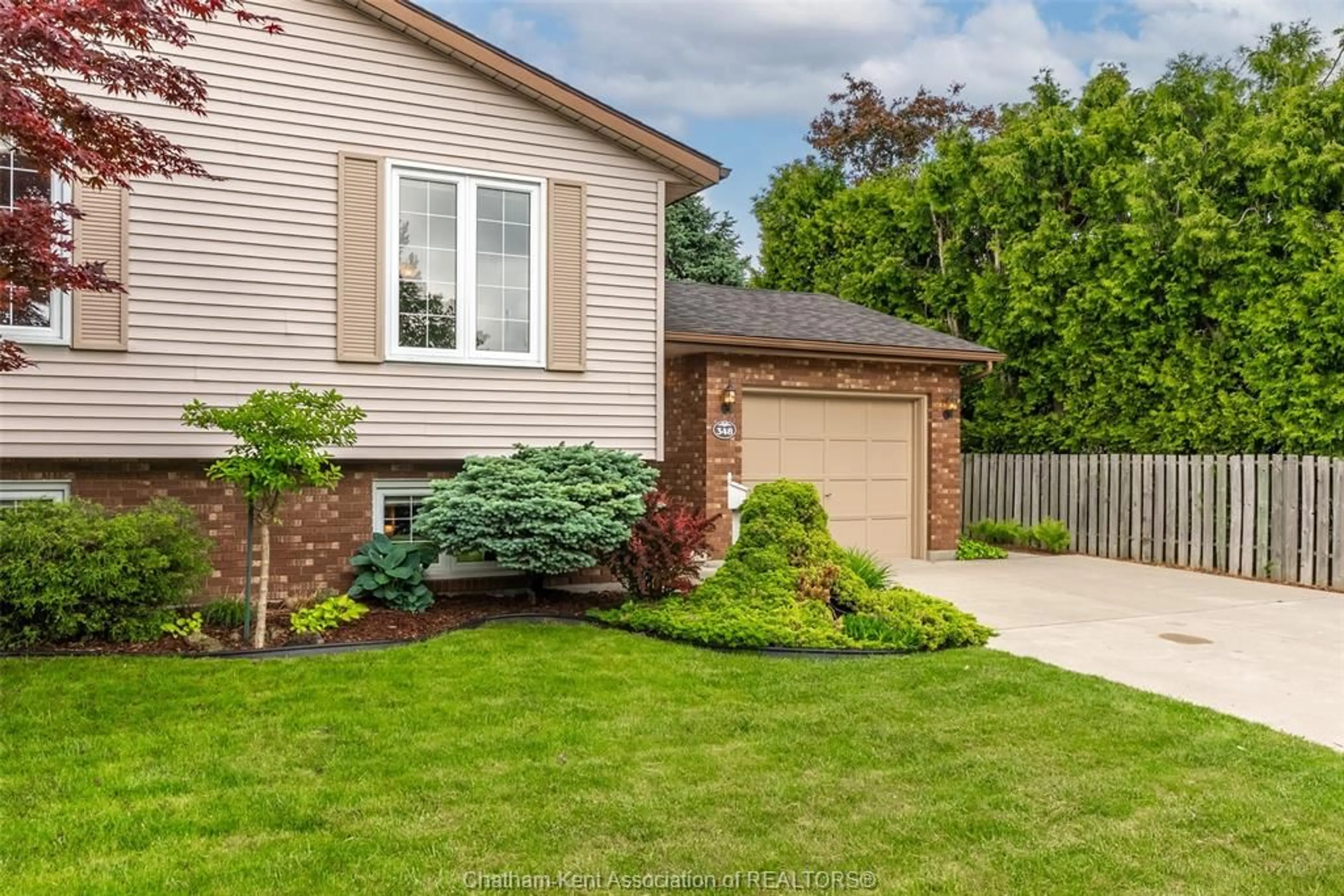 Home with vinyl exterior material, street for 348 Campus Pky, Chatham Ontario N7L 5A8