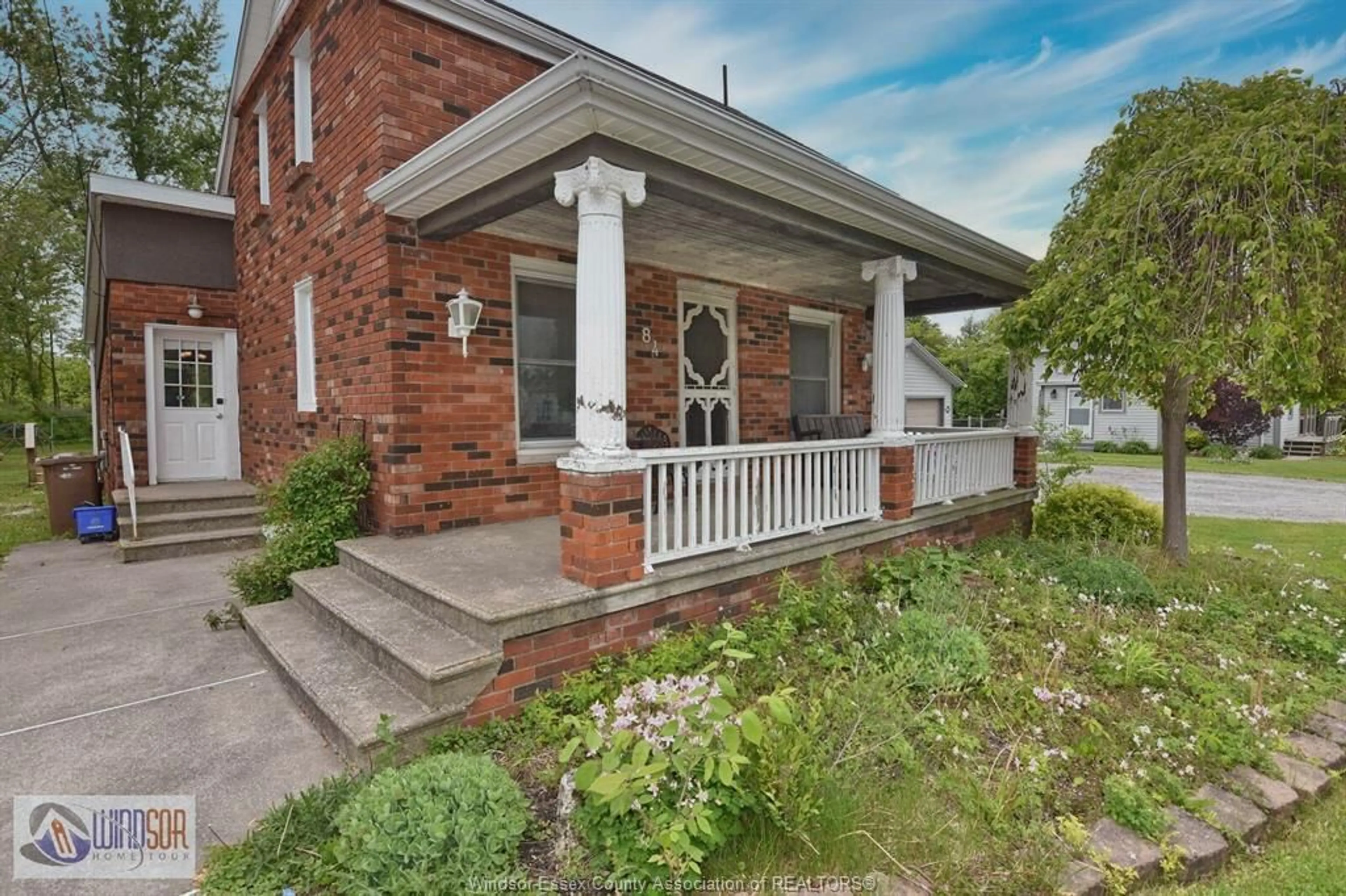 Home with brick exterior material, street for 84 KING St, Lakeshore Ontario N0R 1V0