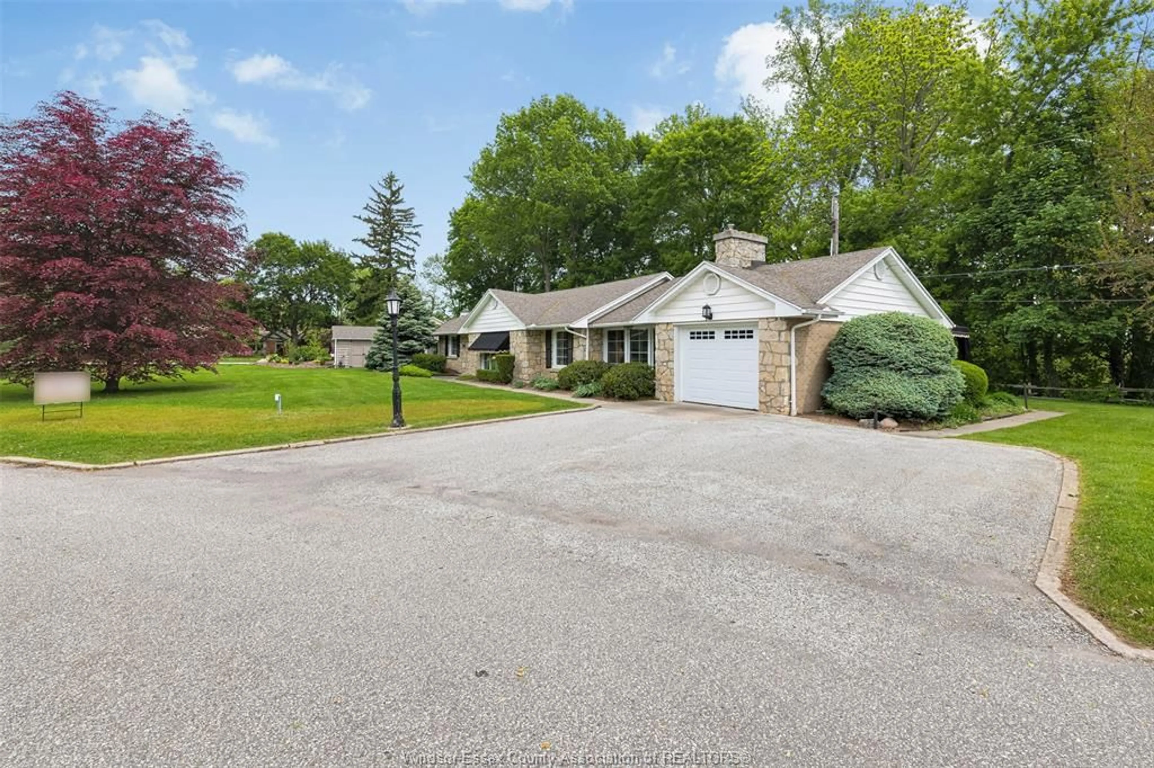 A pic from outside/outdoor area/front of a property/back of a property/a pic from drone, street for 1506 WHITEWOOD, Kingsville Ontario N9Y 2V9