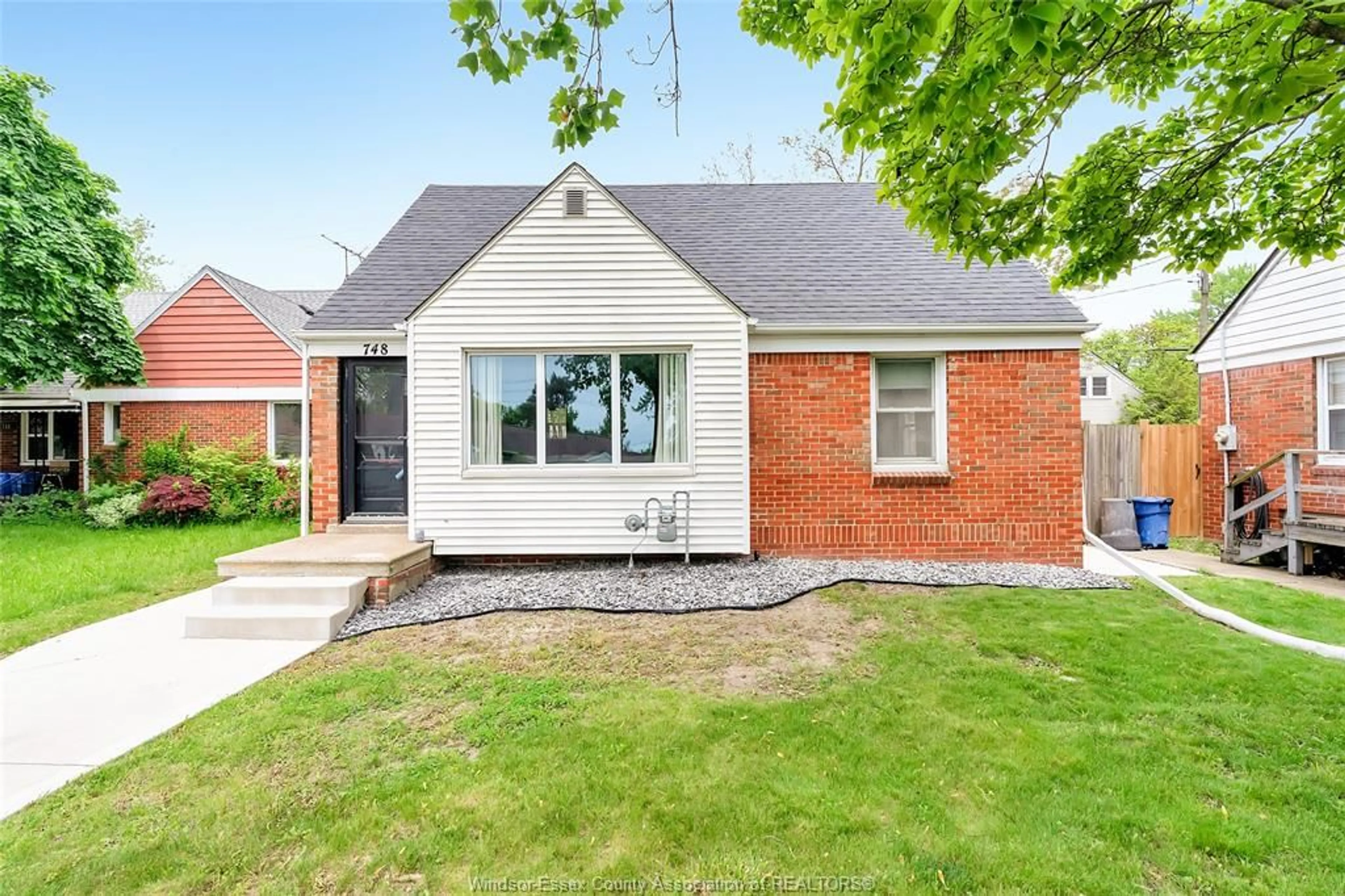 Home with brick exterior material, street for 748 MEMORIAL Dr, Windsor Ontario N8W 1W1