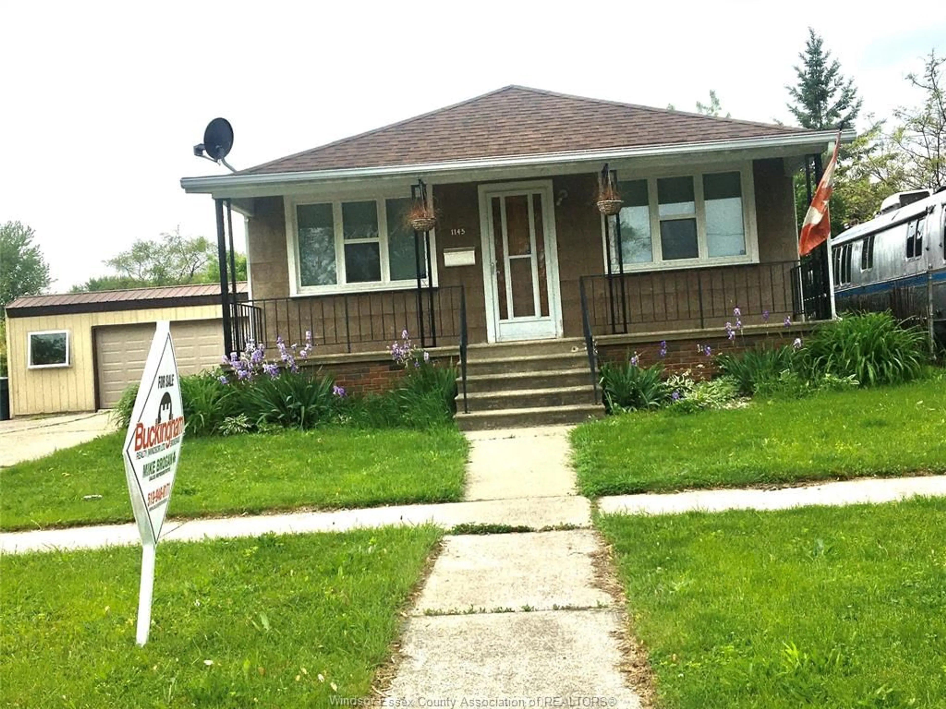 Home with vinyl exterior material, street for 1145 FORD Blvd, Windsor Ontario N8S 2G2
