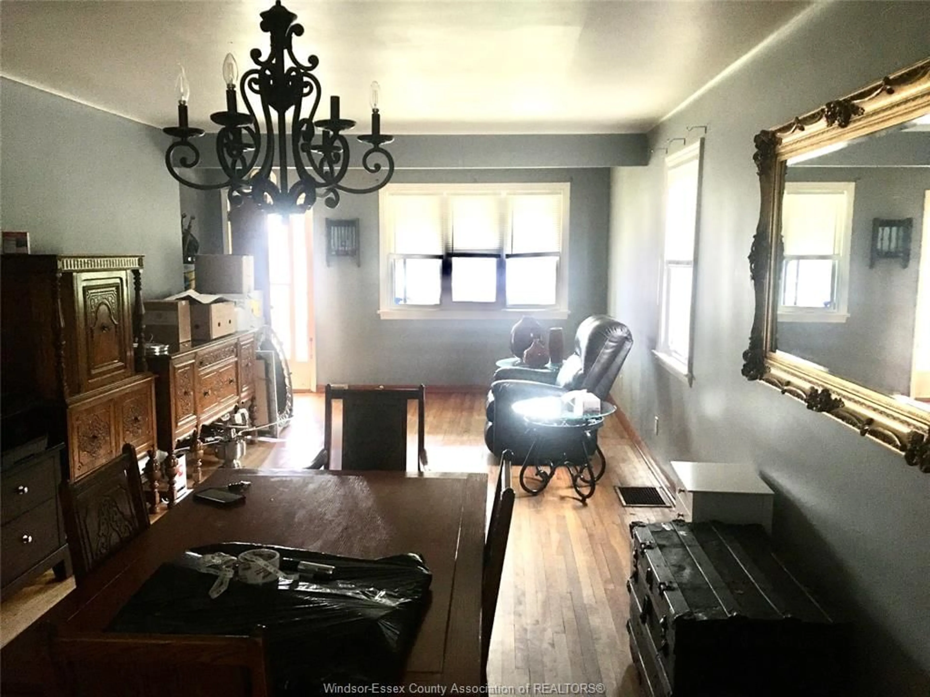 Living room with furniture, wood/laminate floor for 1145 FORD Blvd, Windsor Ontario N8S 2G2
