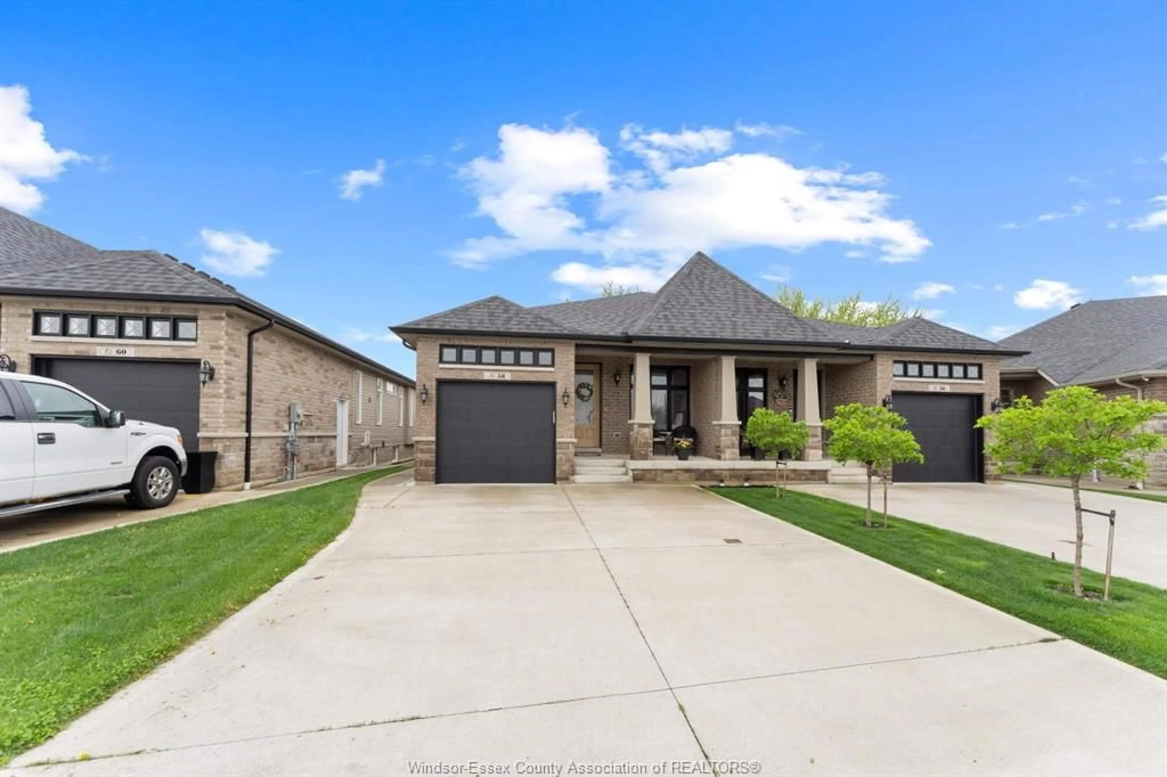 Home with brick exterior material, street for 58 HAZEL Cres, Kingsville Ontario N9Y 0B1