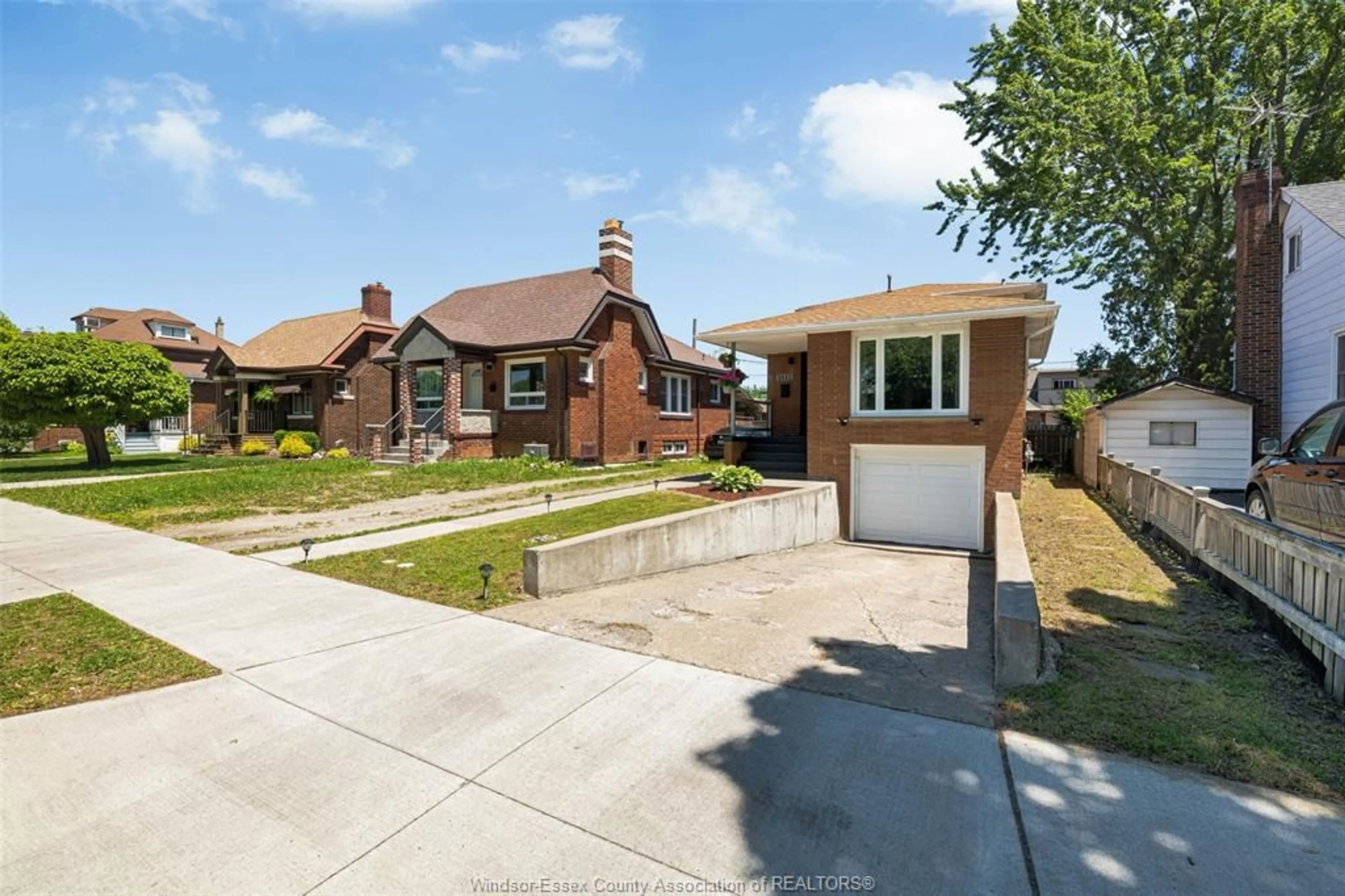Home with brick exterior material, street for 1412 Pillette Road, Windsor Ontario N8Y 3B9