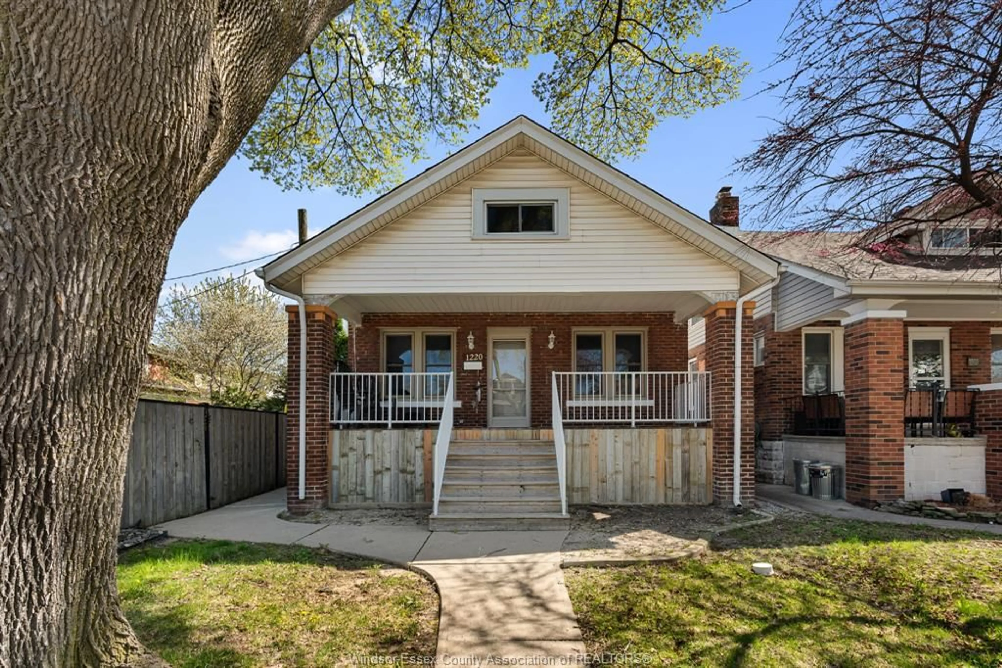 Home with brick exterior material, street for 1220 BRUCE Ave, Windsor Ontario N8X 1X3