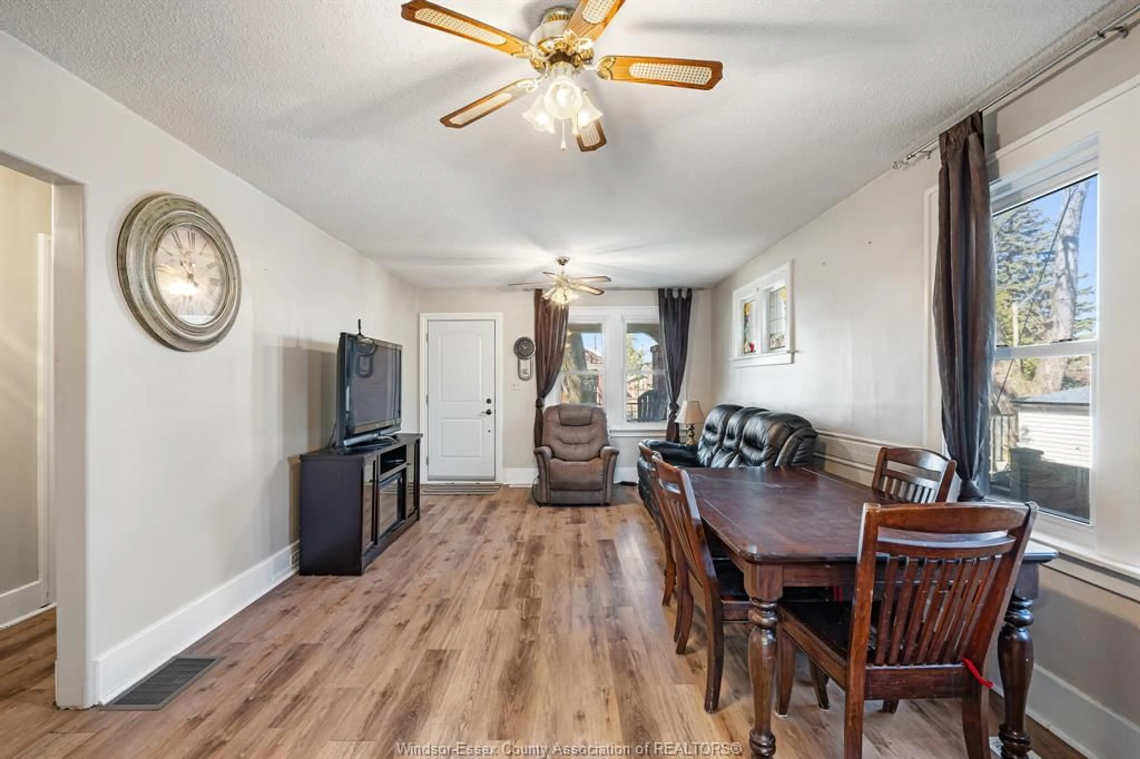 Living room with furniture, wood/laminate floor for 1220 BRUCE Ave, Windsor Ontario N8X 1X3