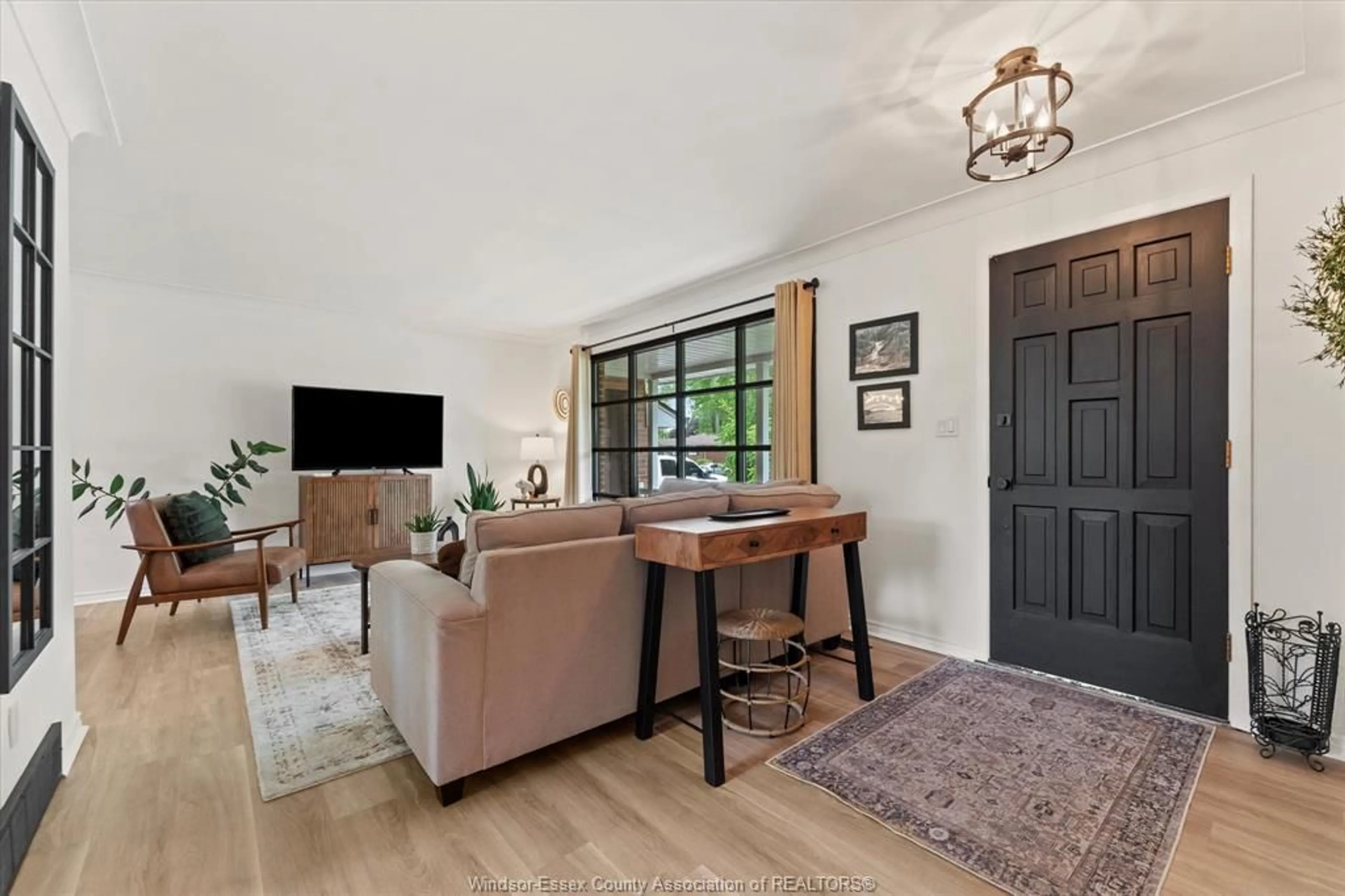 Living room with furniture, wood/laminate floor for 855 Laurier, LaSalle Ontario N9J 1M9