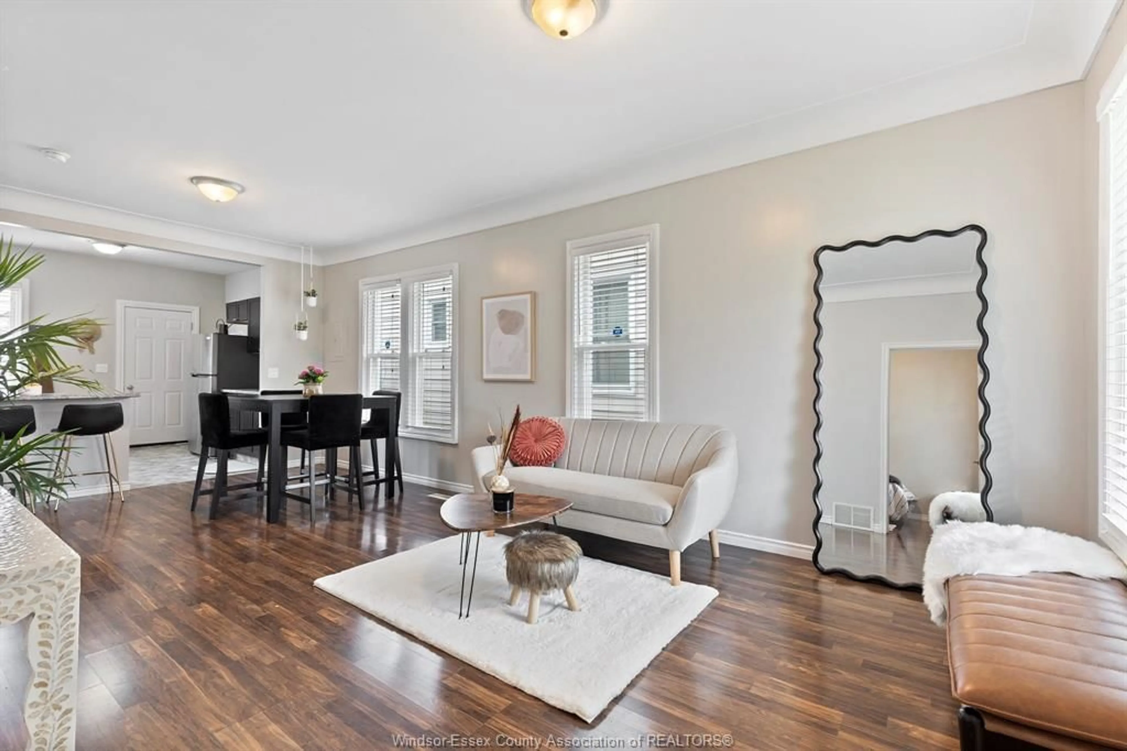 Living room with furniture, wood/laminate floor for 1166 MOY, Windsor Ontario N9A 2P5