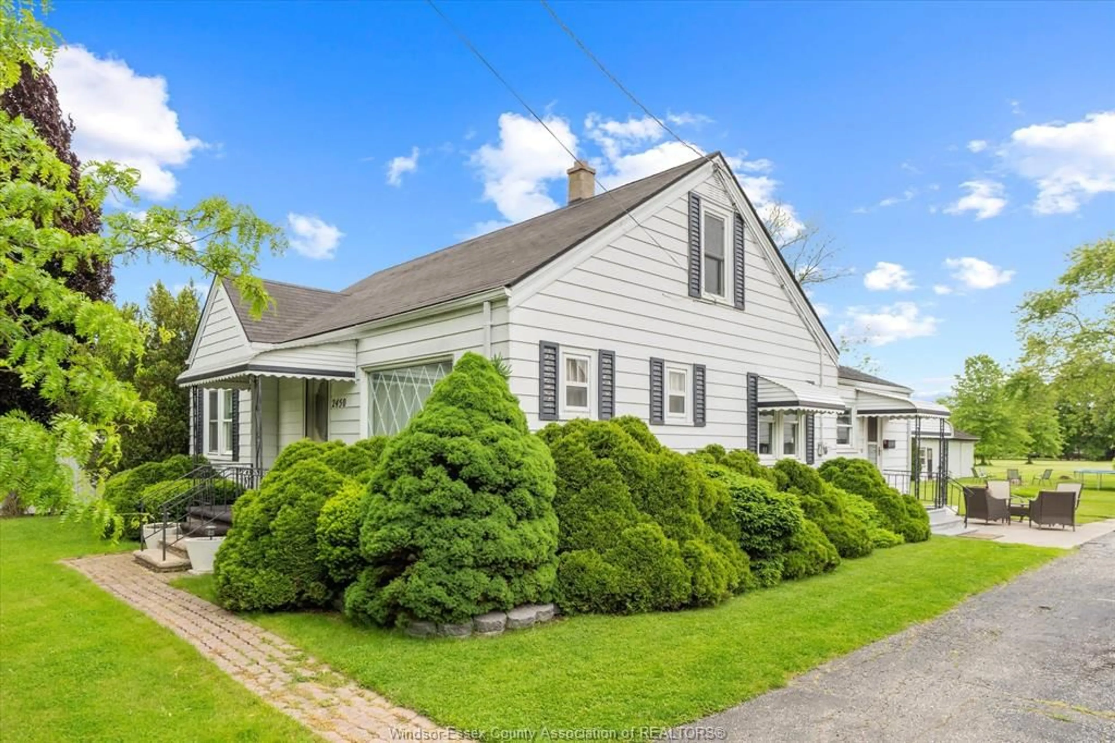 Home with vinyl exterior material, street for 2450 LESPERANCE, Tecumseh Ontario N8N 2W5