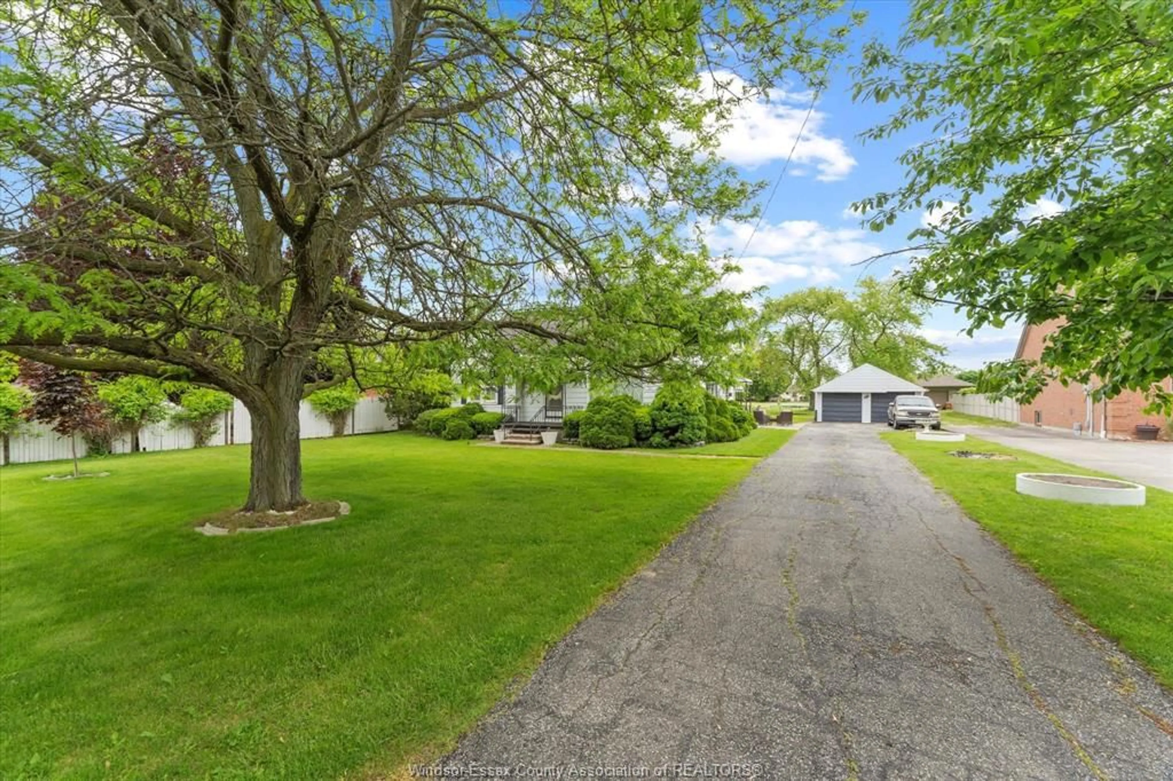 A pic from outside/outdoor area/front of a property/back of a property/a pic from drone, street for 2450 LESPERANCE, Tecumseh Ontario N8N 2W5