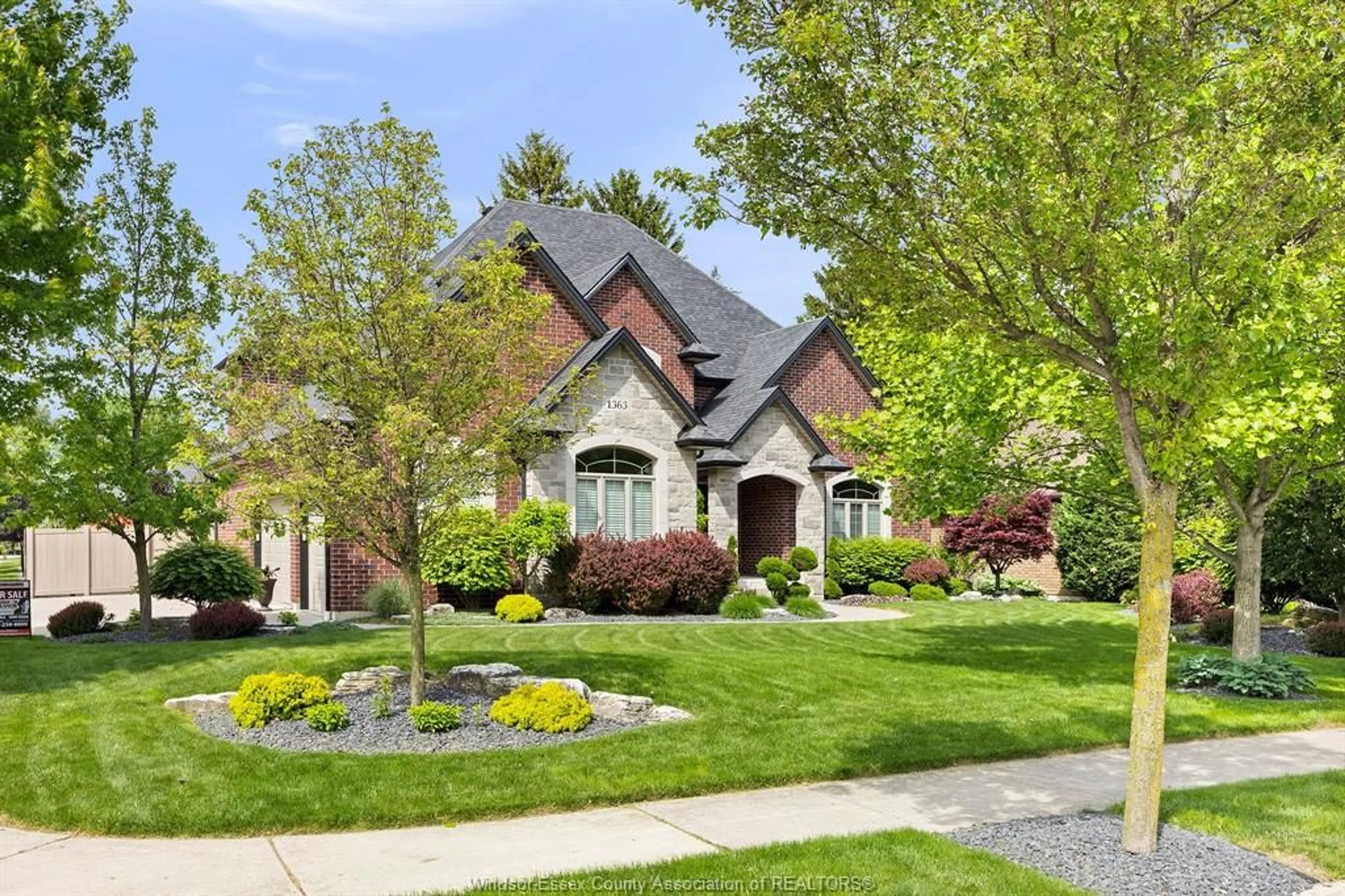 Home with brick exterior material, street for 1363 TUSCANY OAKS Dr, LaSalle Ontario N9J 0B6