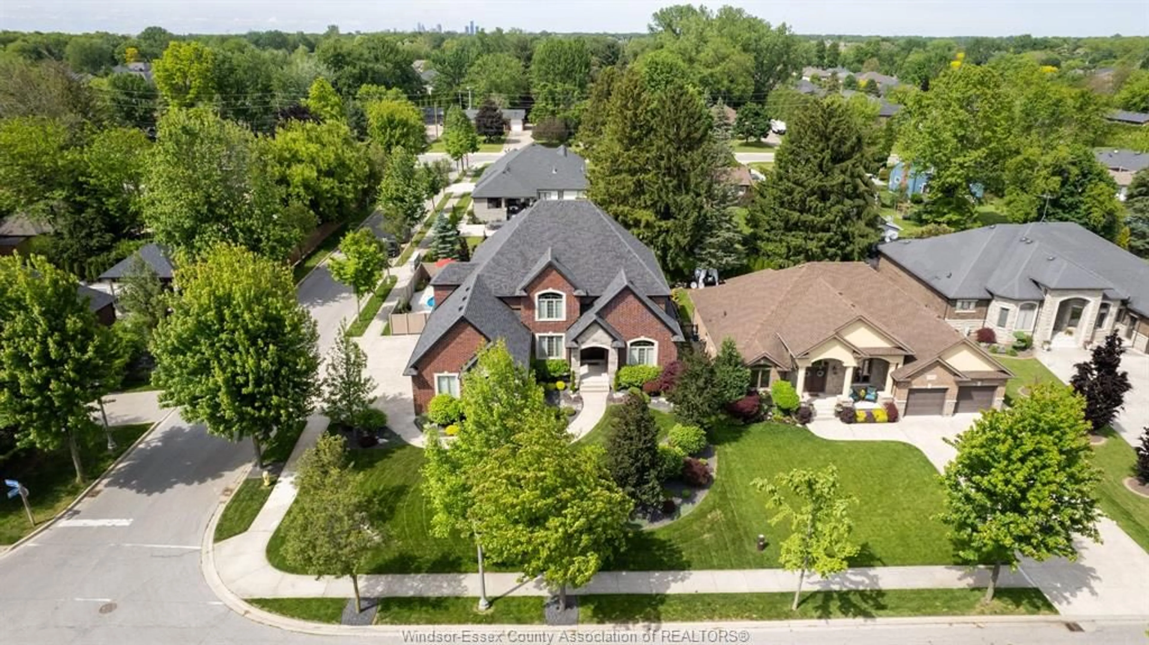 A pic from outside/outdoor area/front of a property/back of a property/a pic from drone, street for 1363 TUSCANY OAKS Dr, LaSalle Ontario N9J 0B6