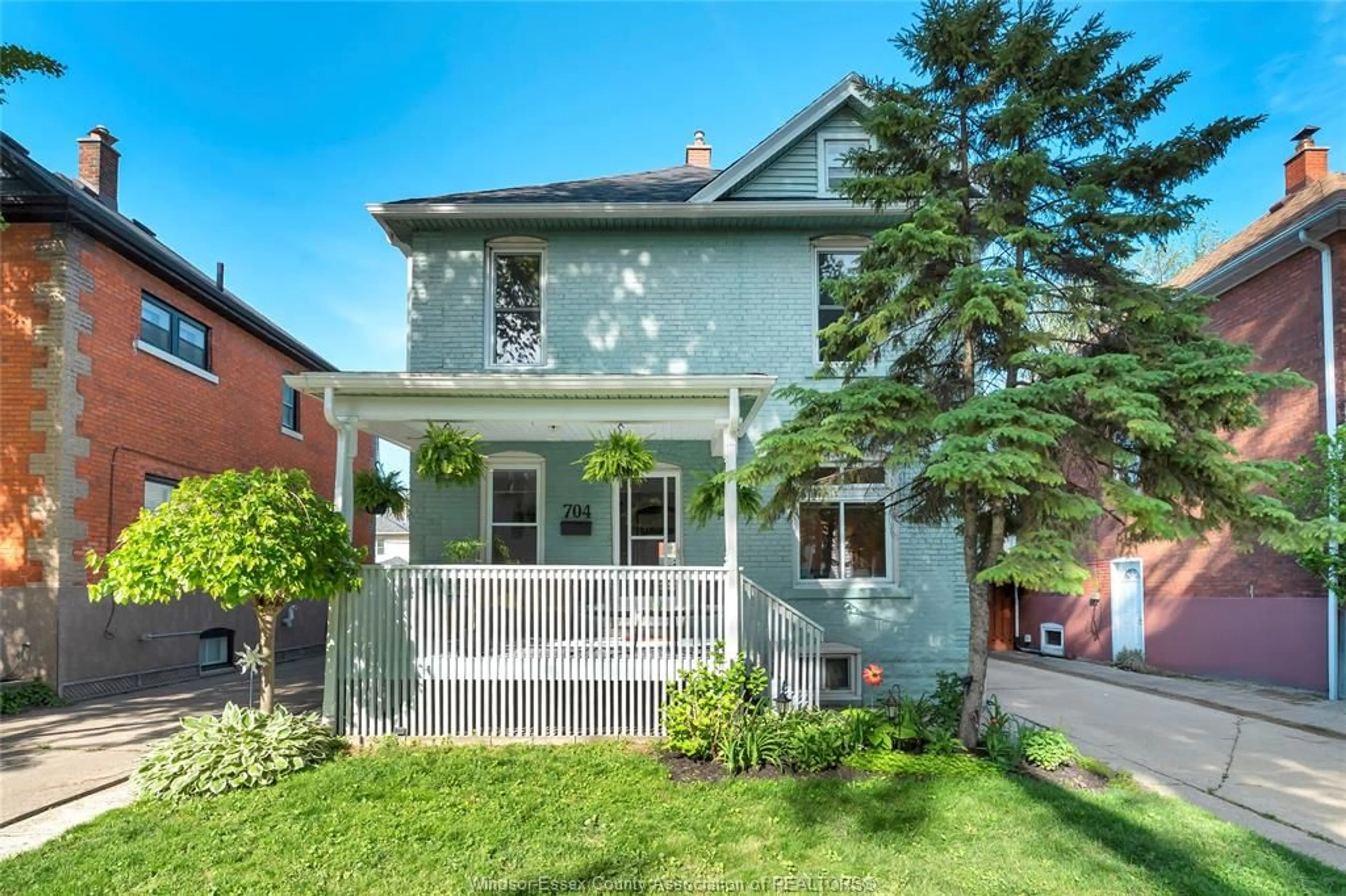 Home with brick exterior material, street for 704 WINDERMERE Rd, Windsor Ontario N8Y 3E1
