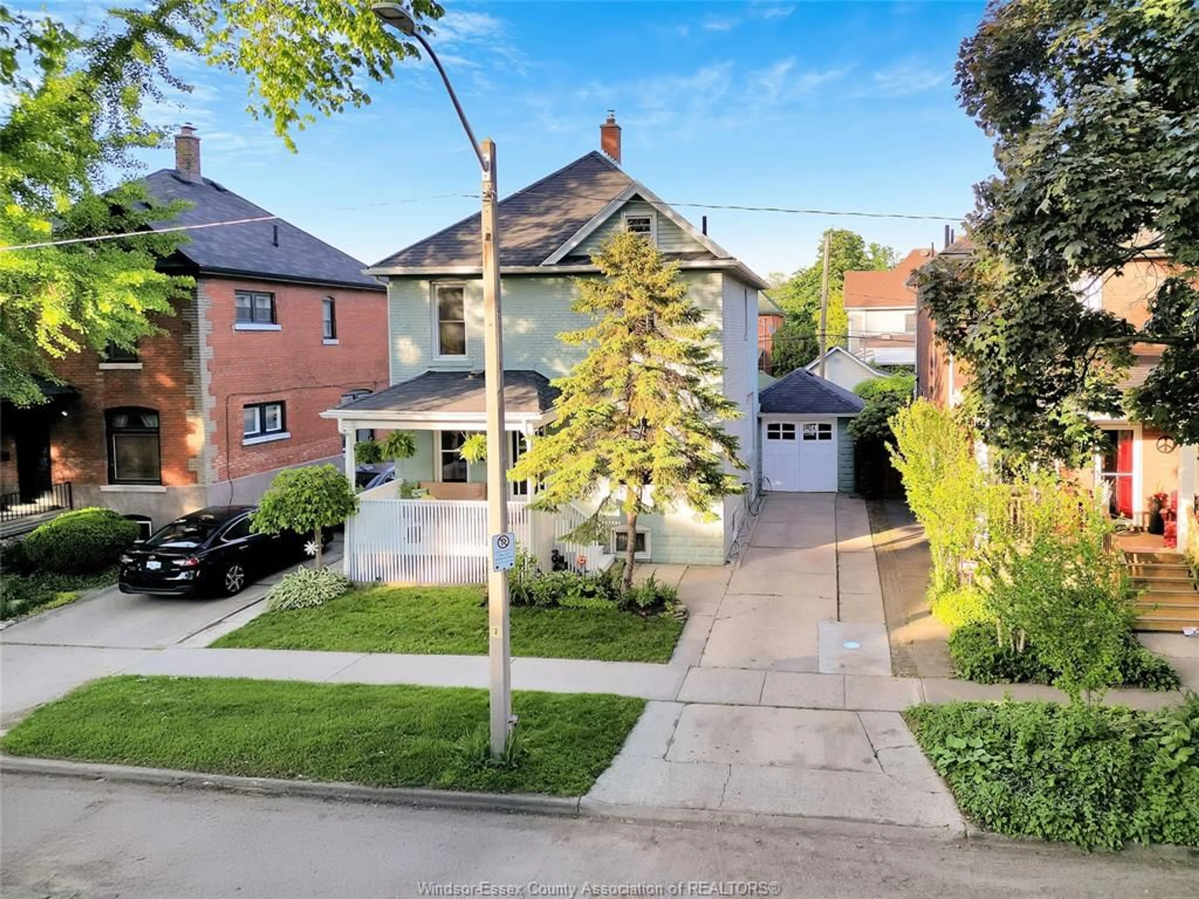 A pic from outside/outdoor area/front of a property/back of a property/a pic from drone, street for 704 WINDERMERE Rd, Windsor Ontario N8Y 3E1