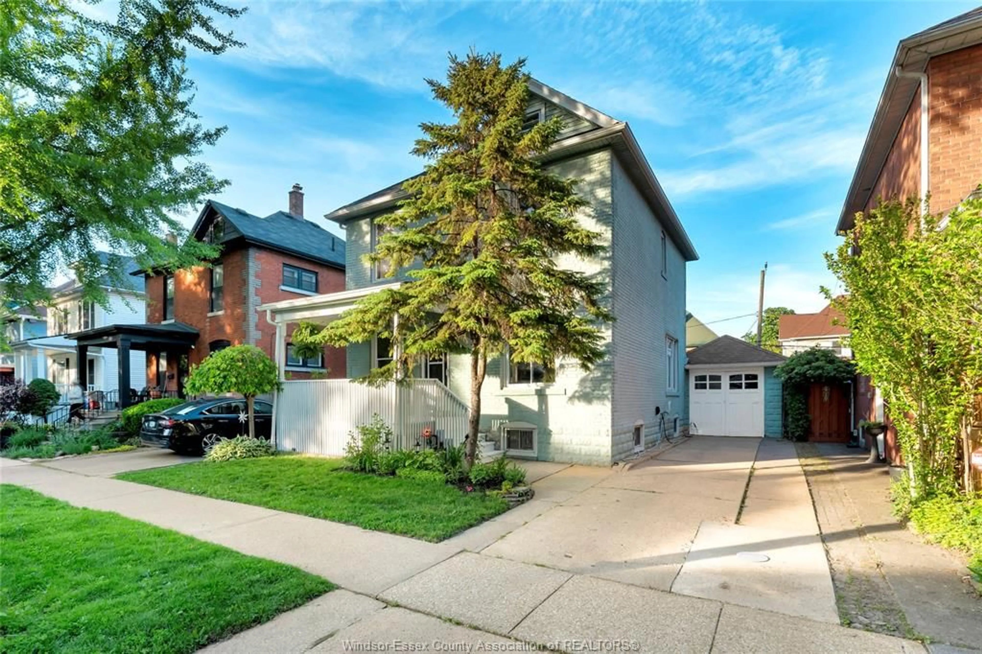 Home with brick exterior material, street for 704 WINDERMERE Rd, Windsor Ontario N8Y 3E1