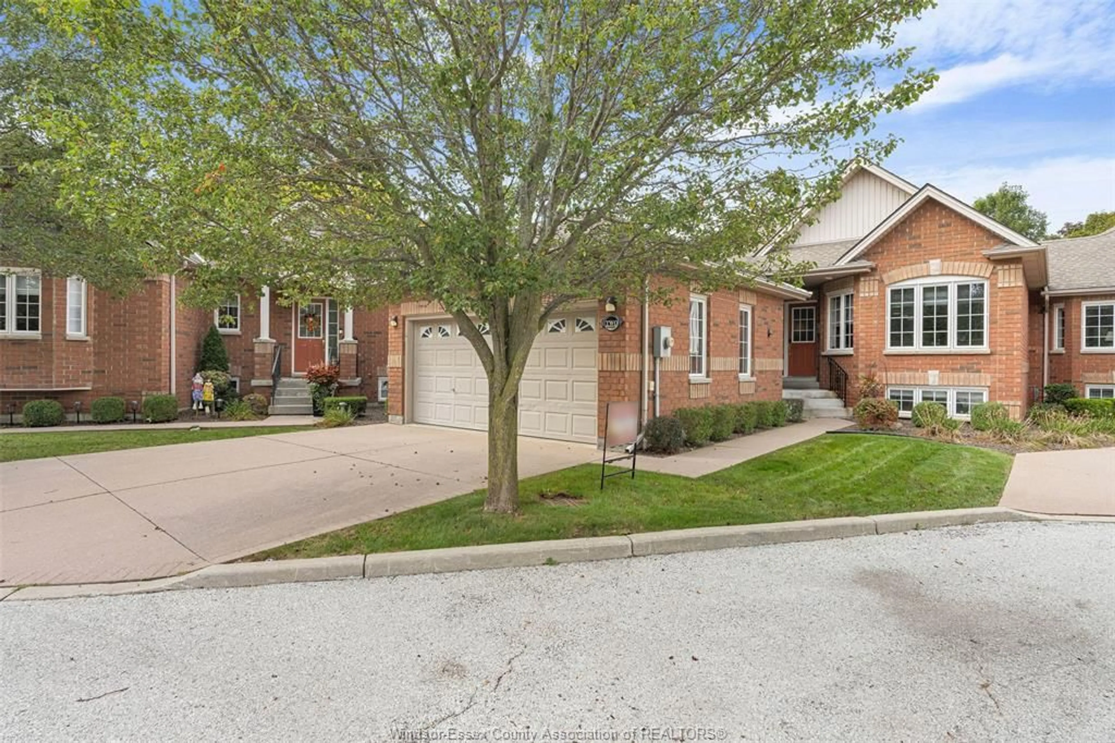 Home with brick exterior material, street for 32 ROBSON Rd #2, Leamington Ontario N8H 2M9