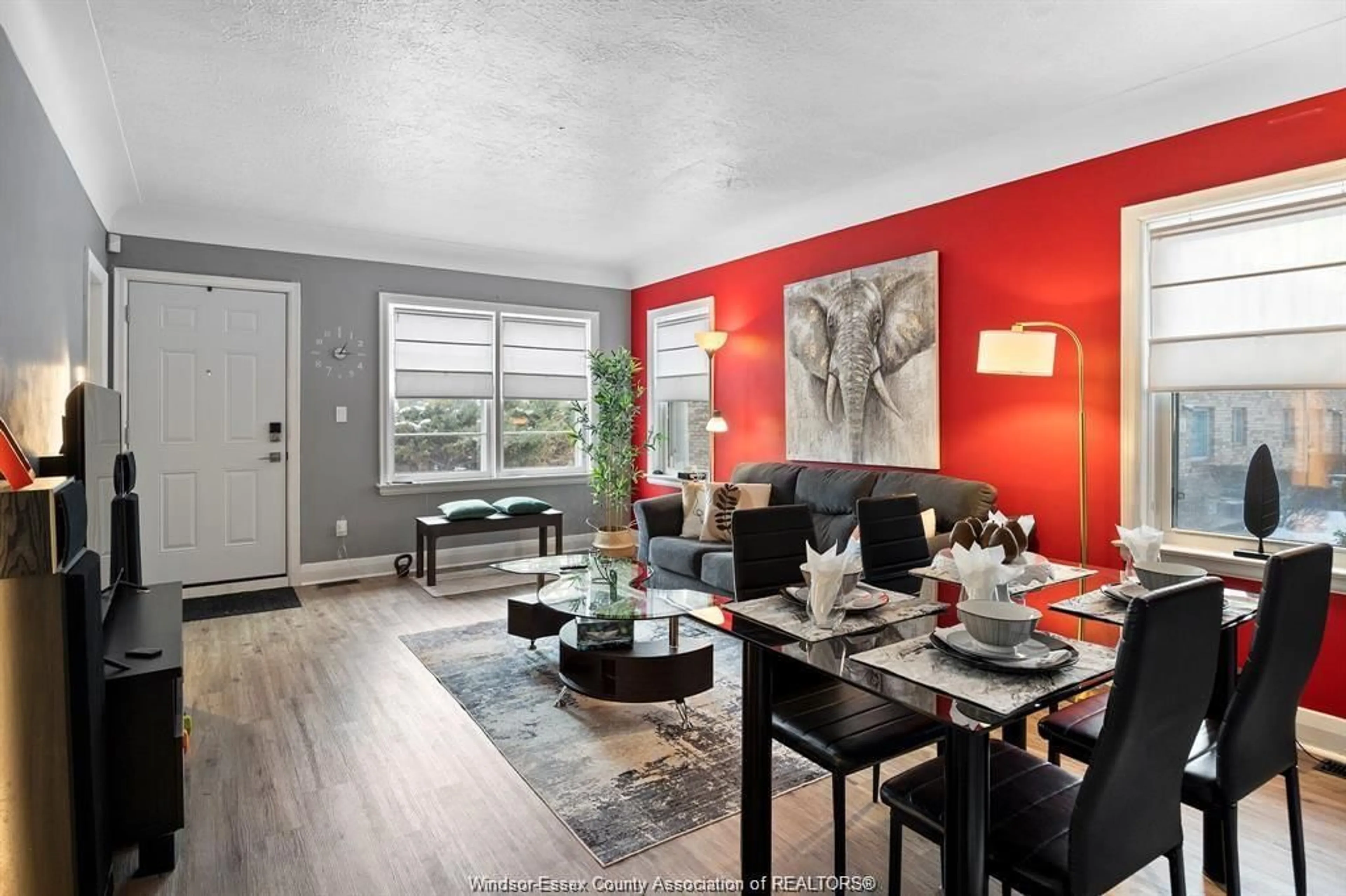 Living room with furniture, wood/laminate floor for 630 GRAND MARAIS, Windsor Ontario N8X 3H5