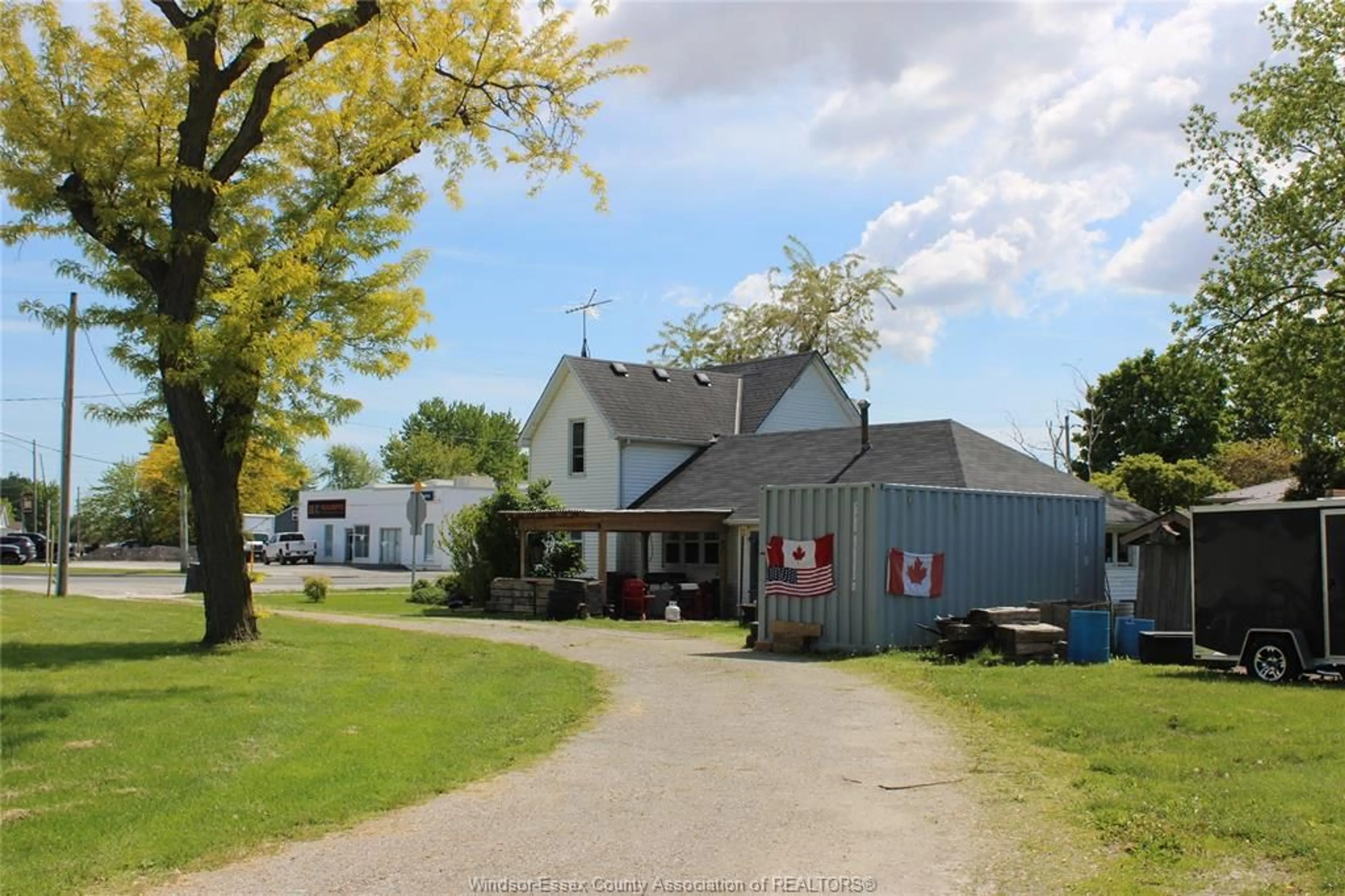 A pic from outside/outdoor area/front of a property/back of a property/a pic from drone, street for 6212 COUNTY RD 46, Lakeshore Ontario N0P 1J0