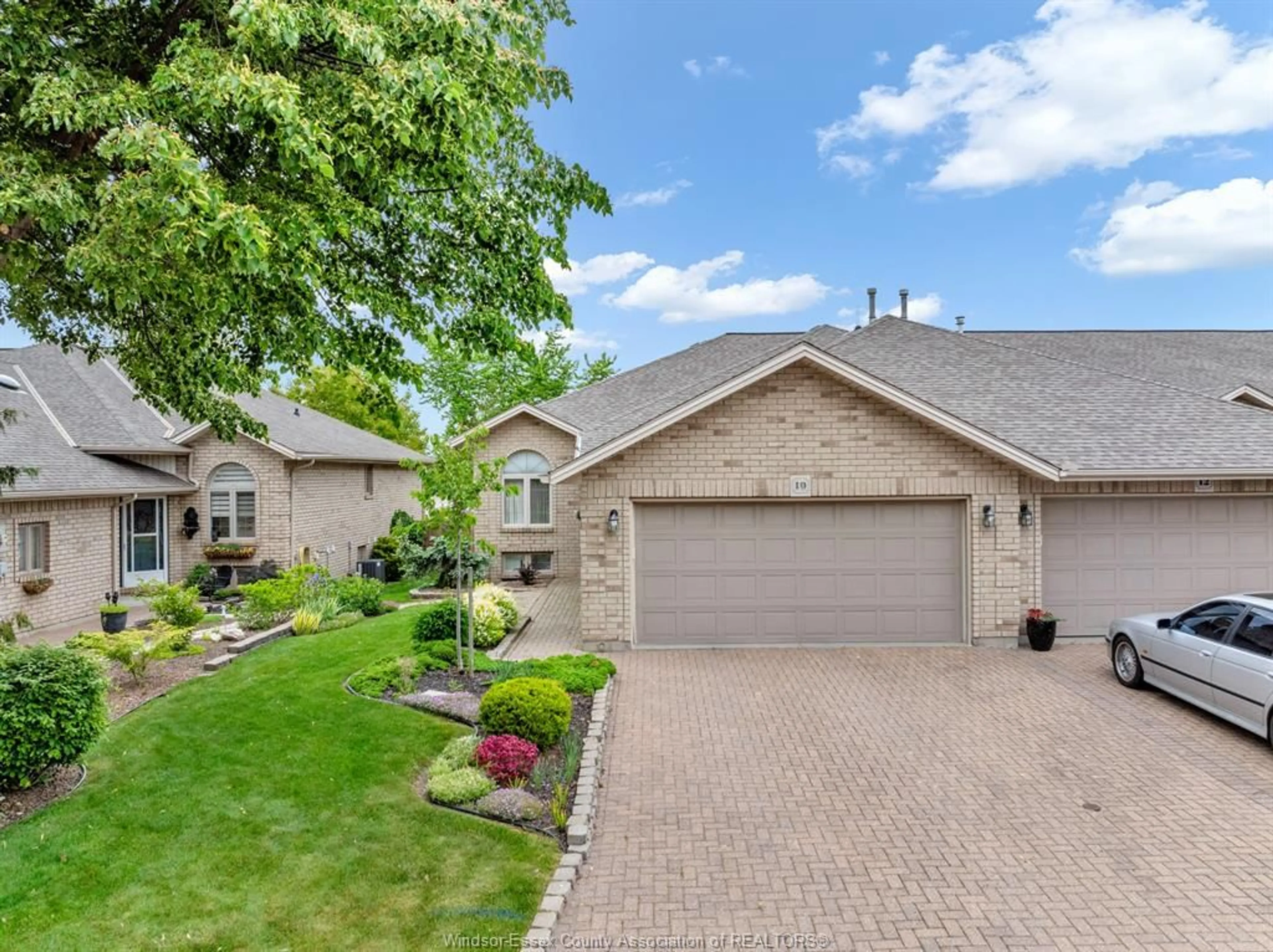 Home with brick exterior material, street for 10 QUEENS HILL Cres, Leamington Ontario N8H 5M6
