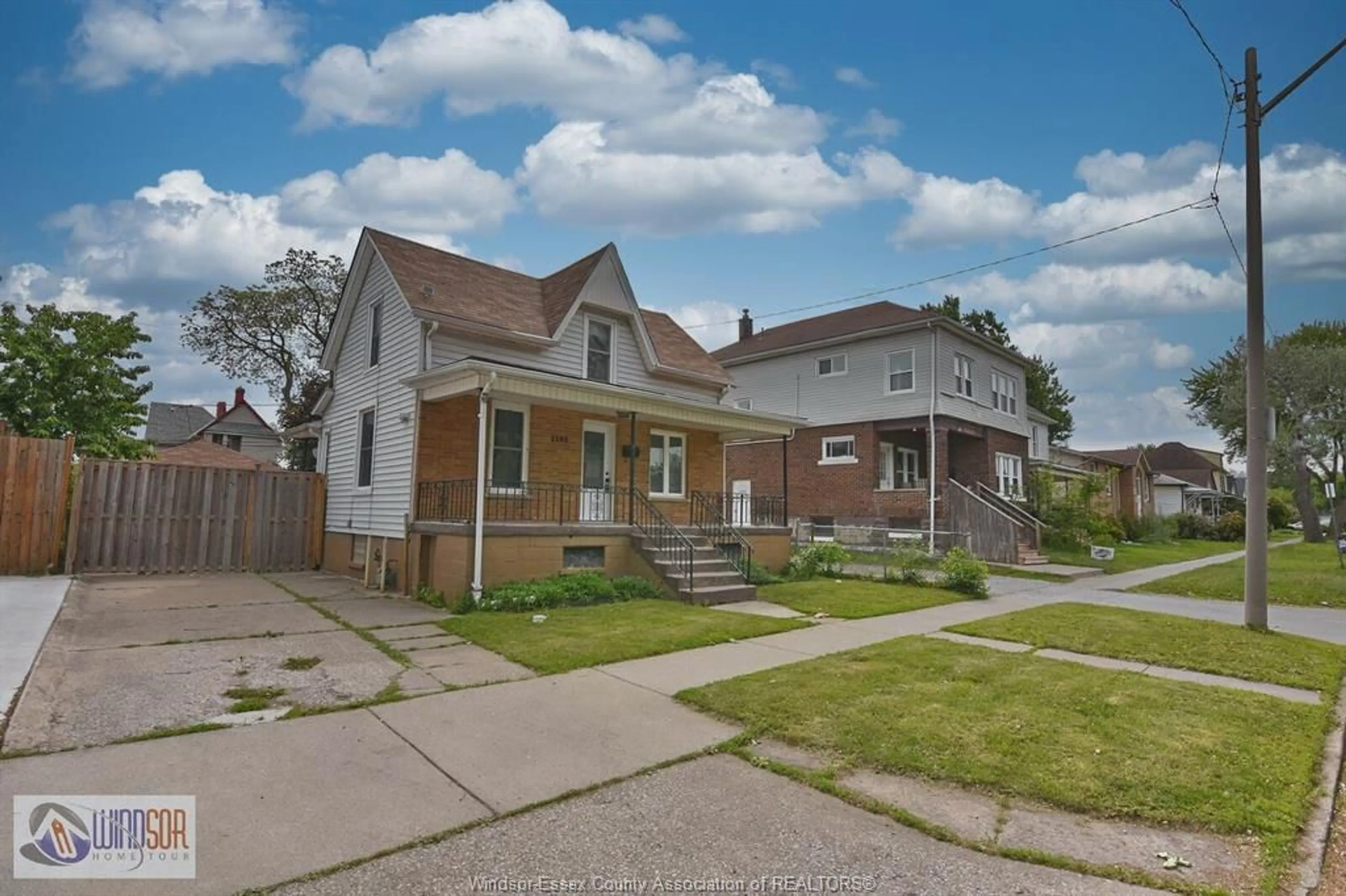 Home with brick exterior material, street for 1104 HIGHLAND, Windsor Ontario N9A 1R7