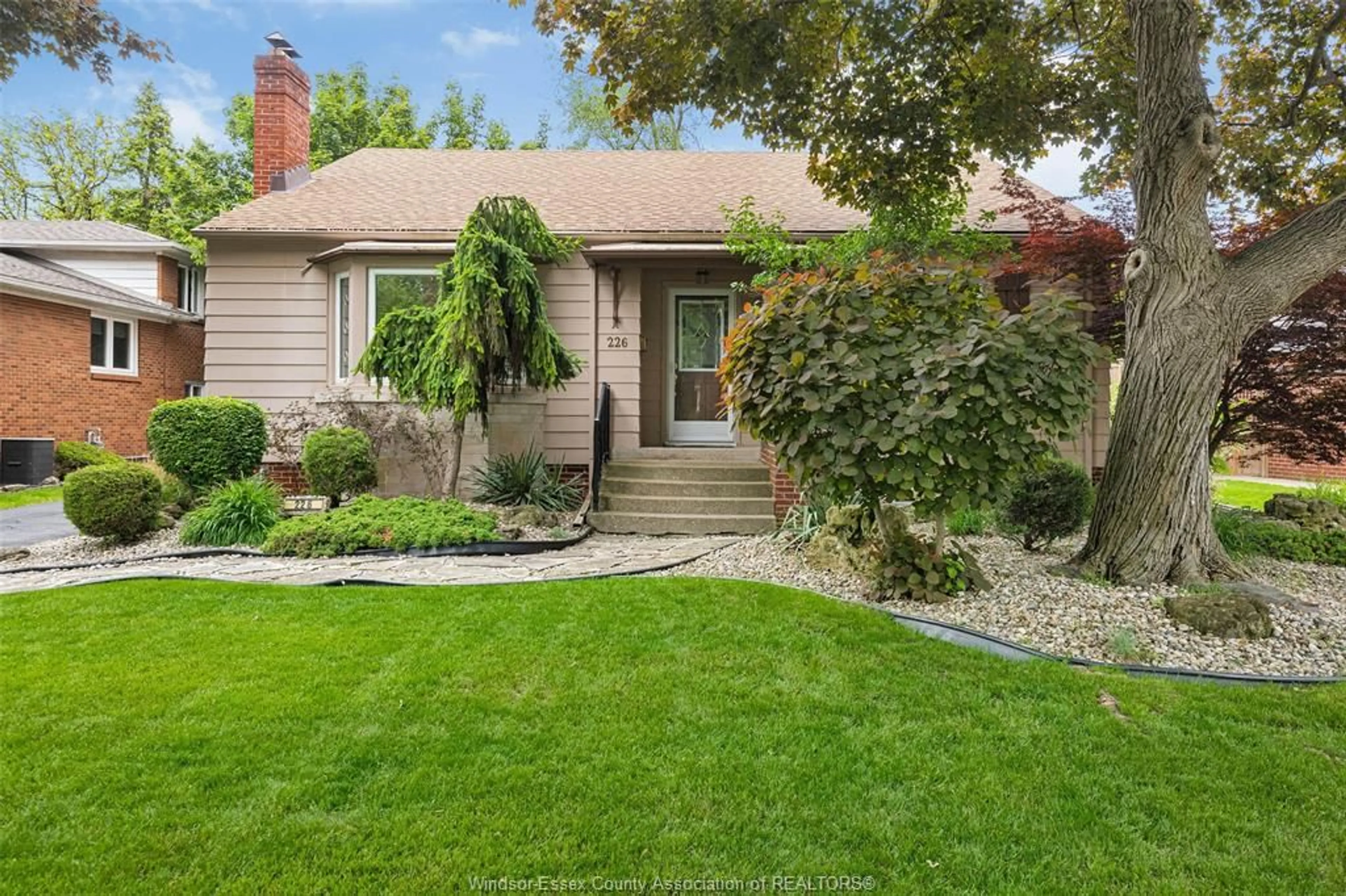 Home with brick exterior material, street for 226 REEDMERE Rd, Windsor Ontario N8S 2L4