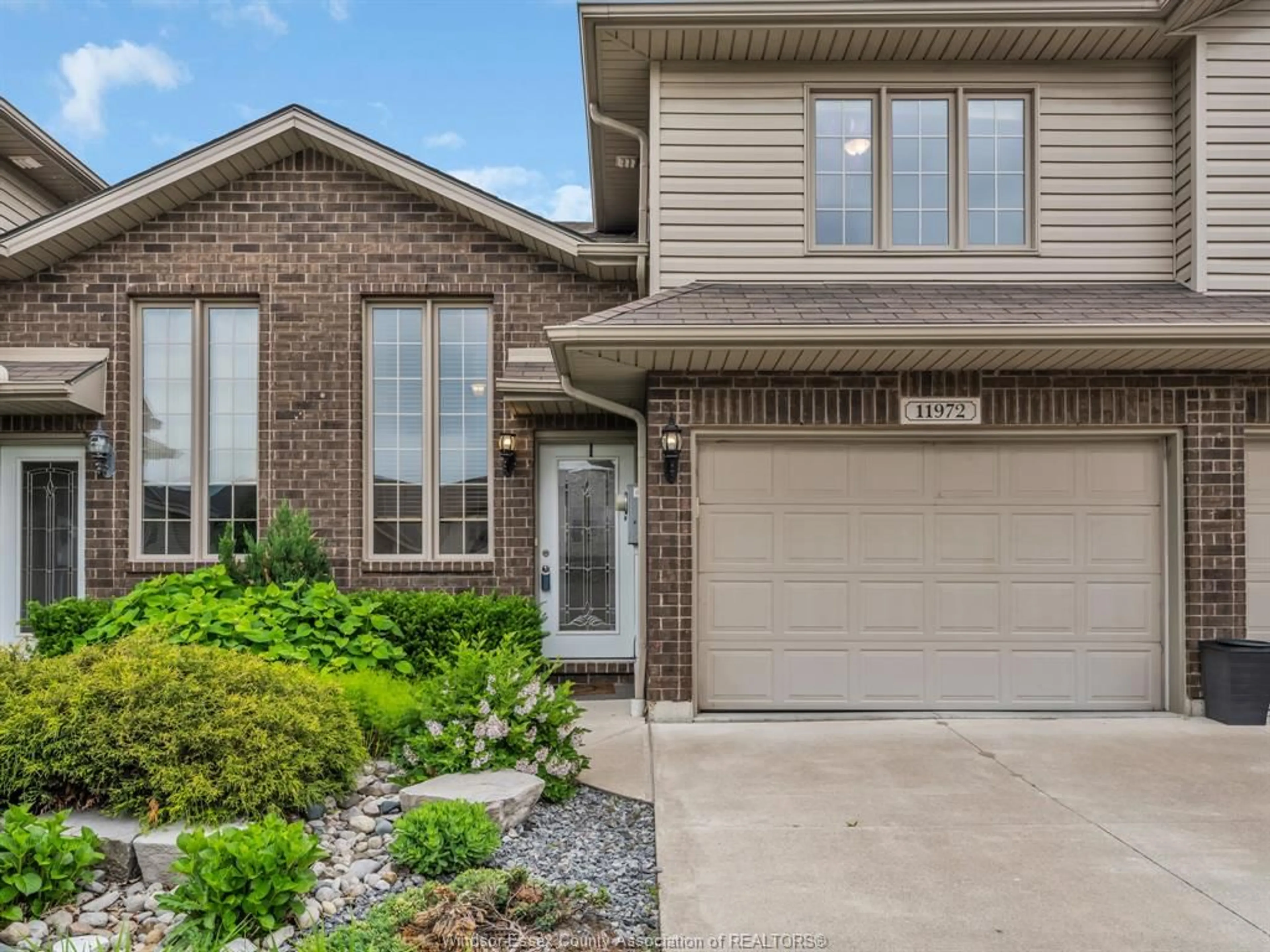 Home with brick exterior material, street for 11972 BOULDER Cres, Windsor Ontario N8P 1Z6