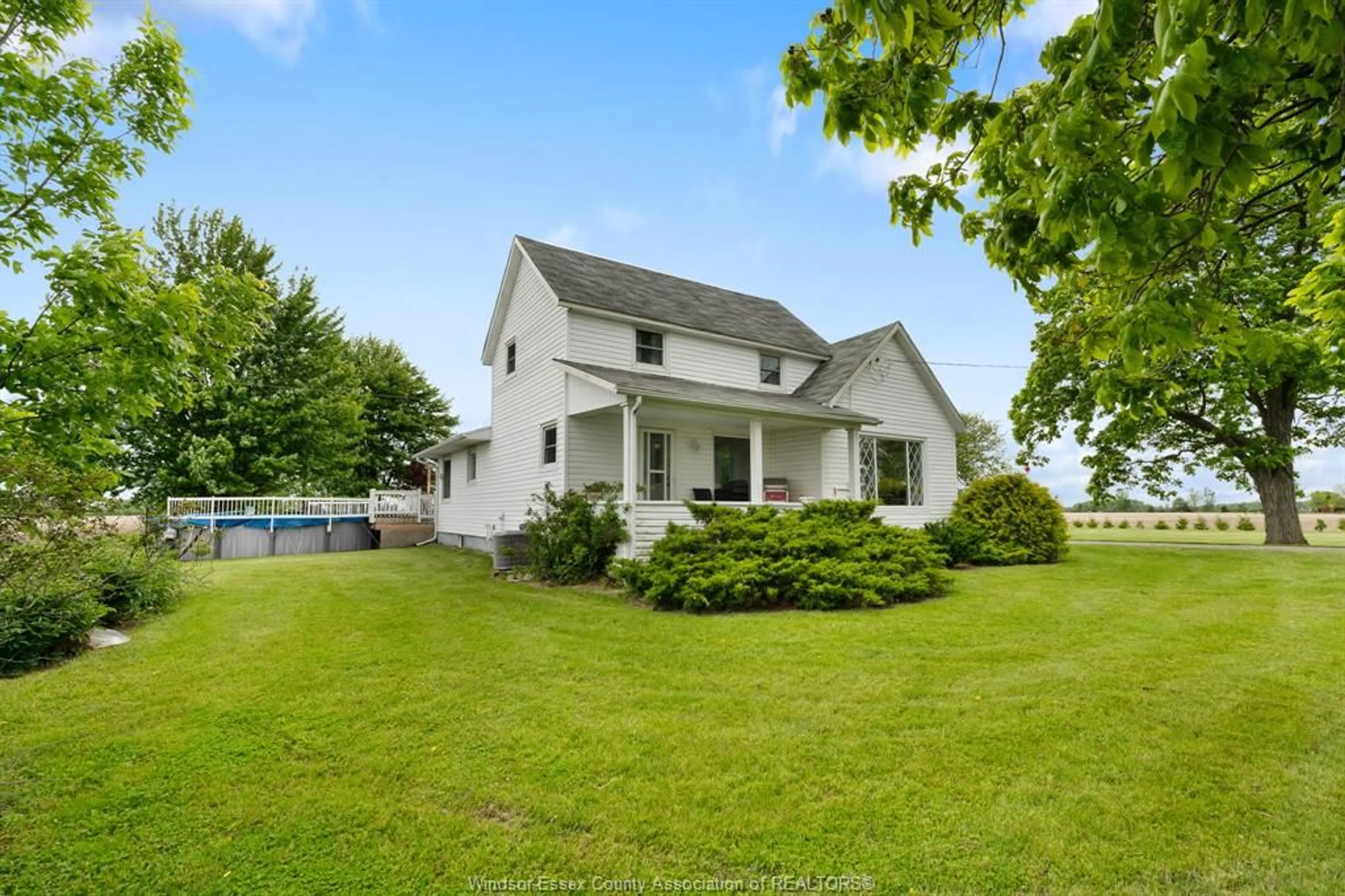 A pic from outside/outdoor area/front of a property/back of a property/a pic from drone, water/lake/river/ocean view for 712 ROAD 11, Kingsville Ontario N0R 1V0