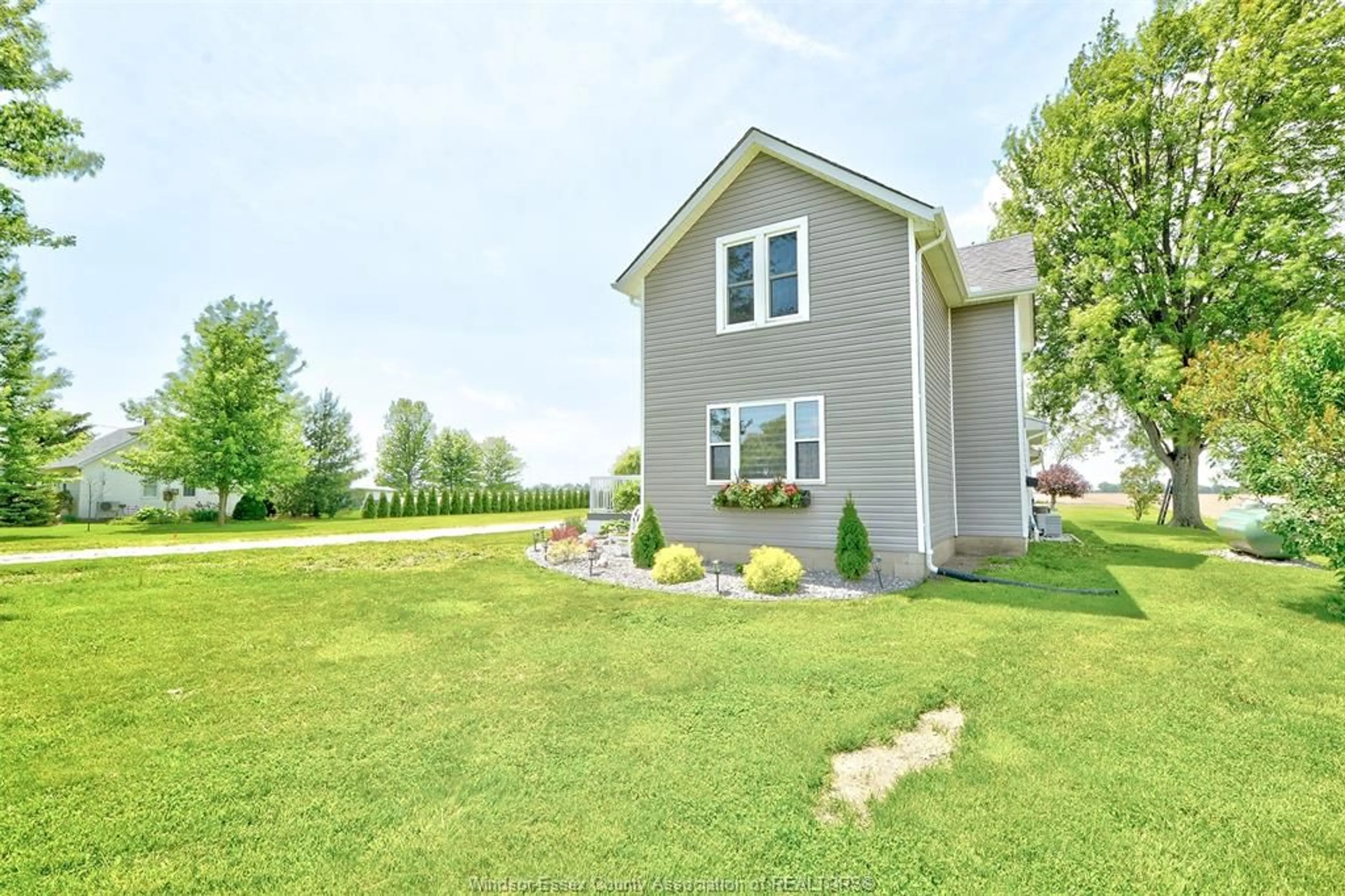 A pic from outside/outdoor area/front of a property/back of a property/a pic from drone, water/lake/river/ocean view for 9672 9TH CONC. S, Amherstburg Ontario N9V 2Y7