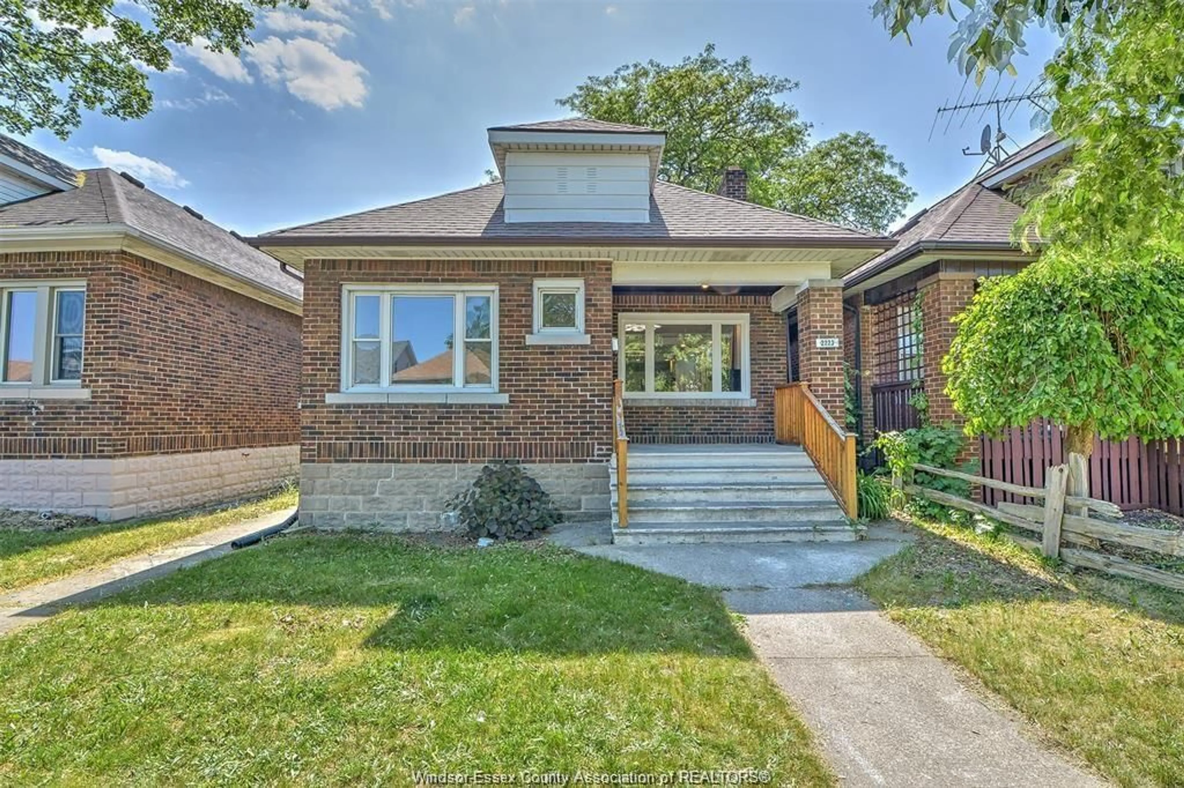 Home with brick exterior material, street for 2223 FRASER Avenue, Windsor Ontario N8X 3Z6