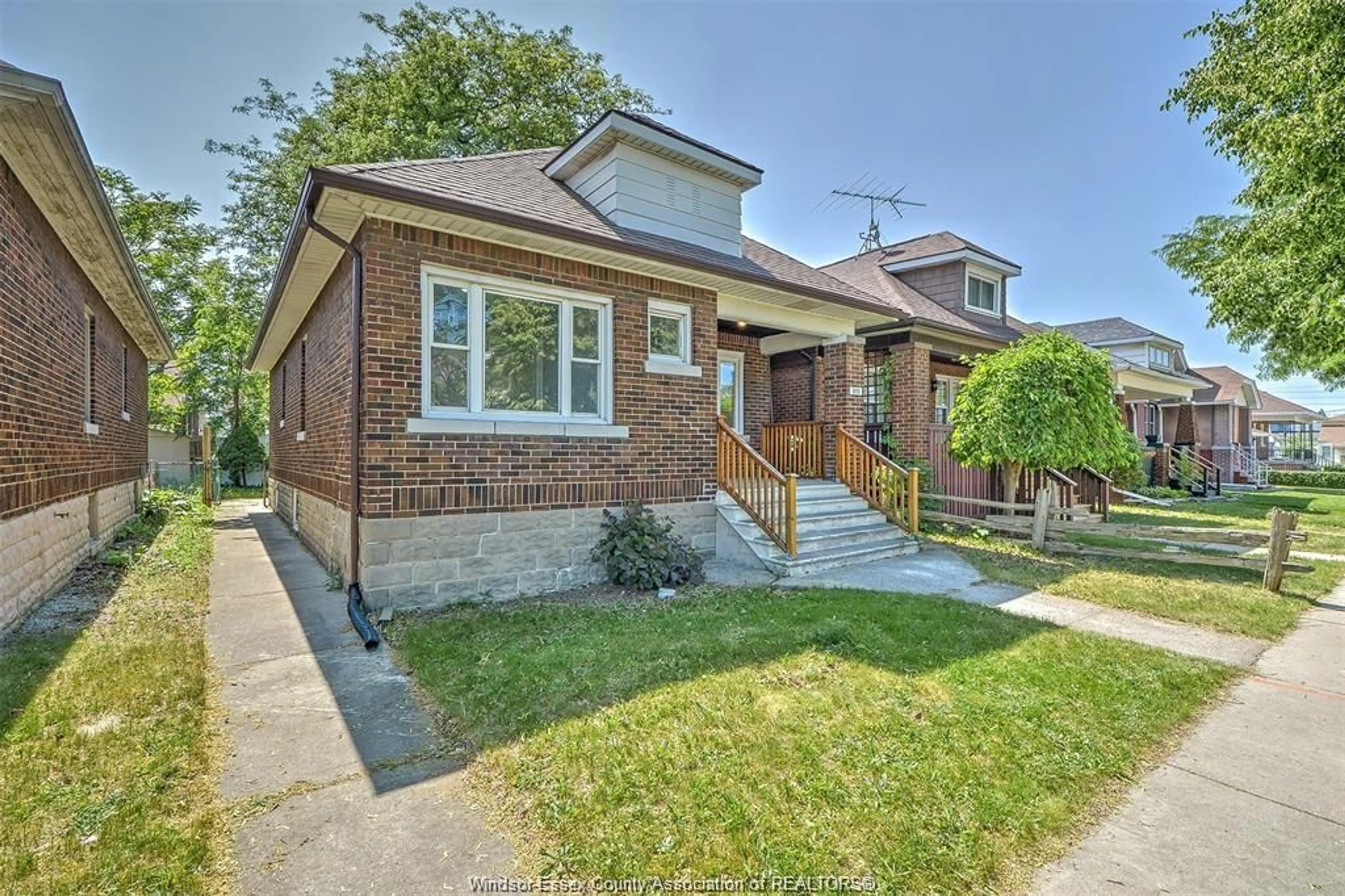 Home with brick exterior material, street for 2223 FRASER Avenue, Windsor Ontario N8X 3Z6
