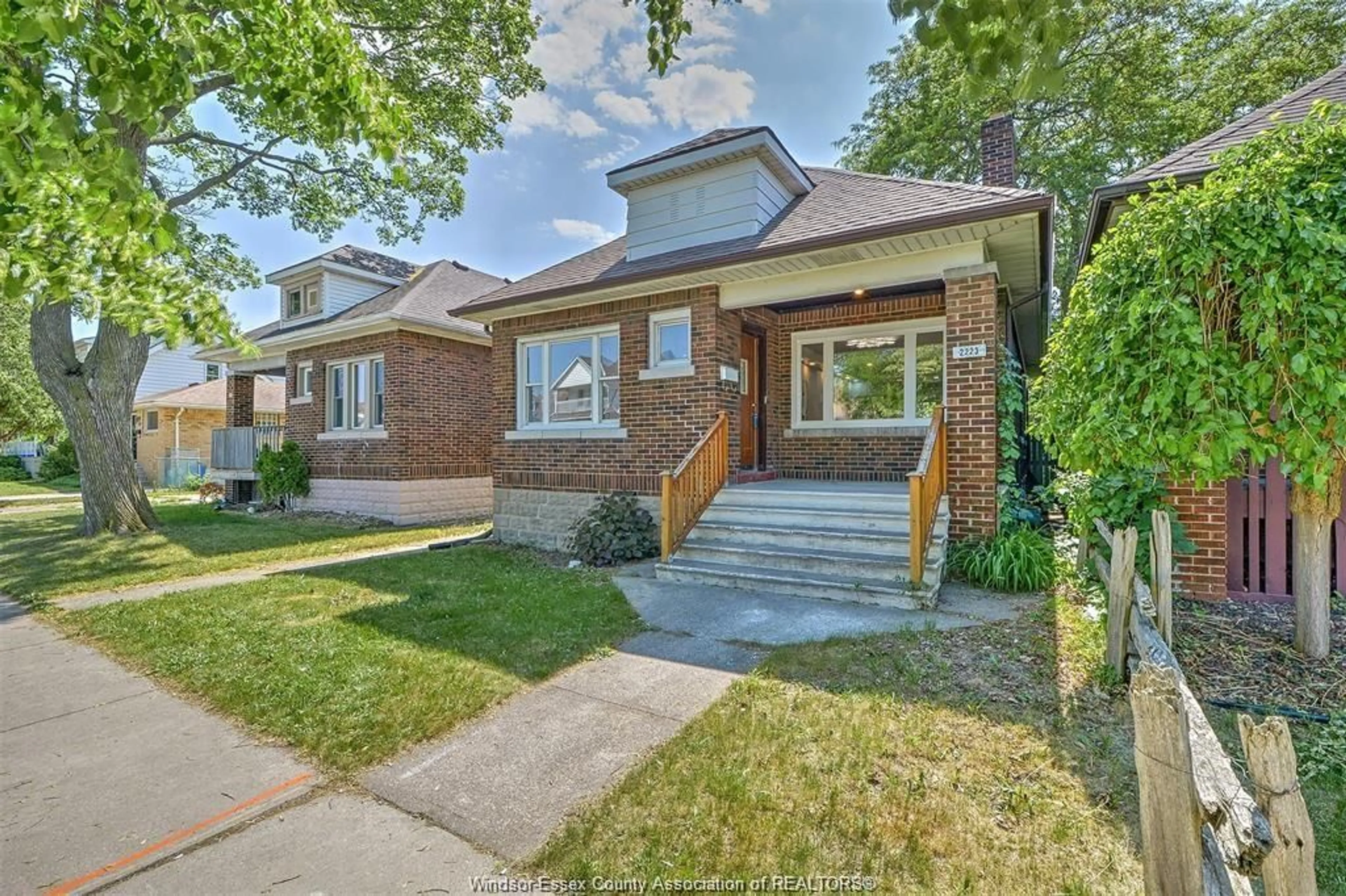 Home with brick exterior material, street for 2223 FRASER Avenue, Windsor Ontario N8X 3Z6
